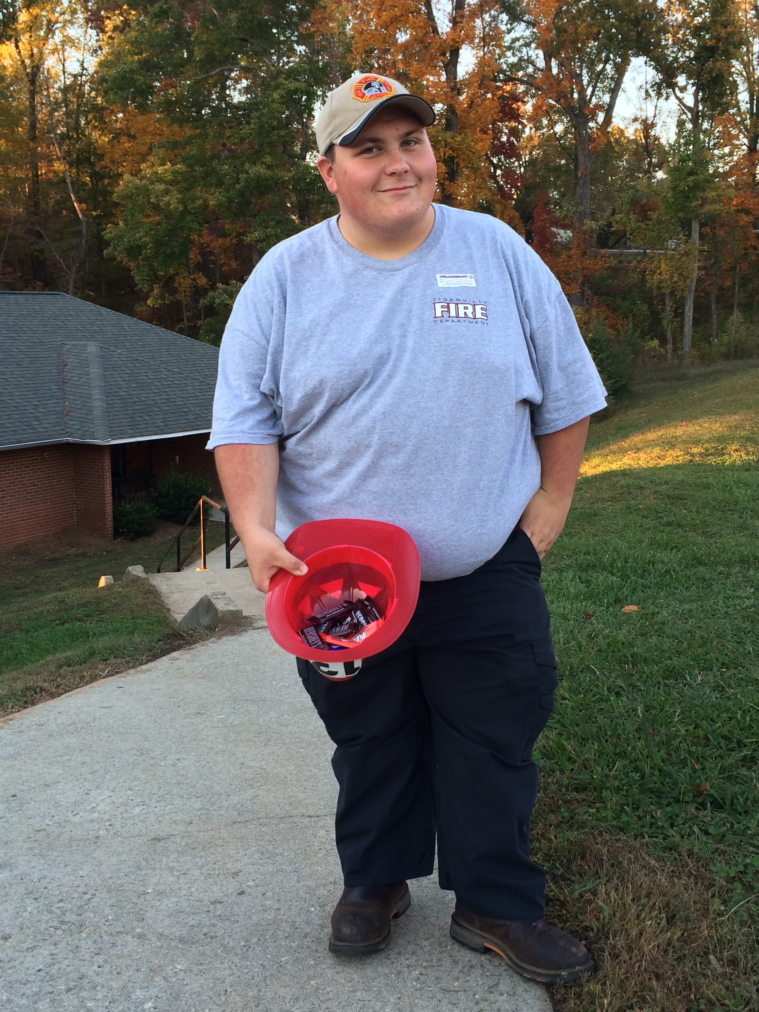 Conley Trammell handed out candy to trick-or-treaters.