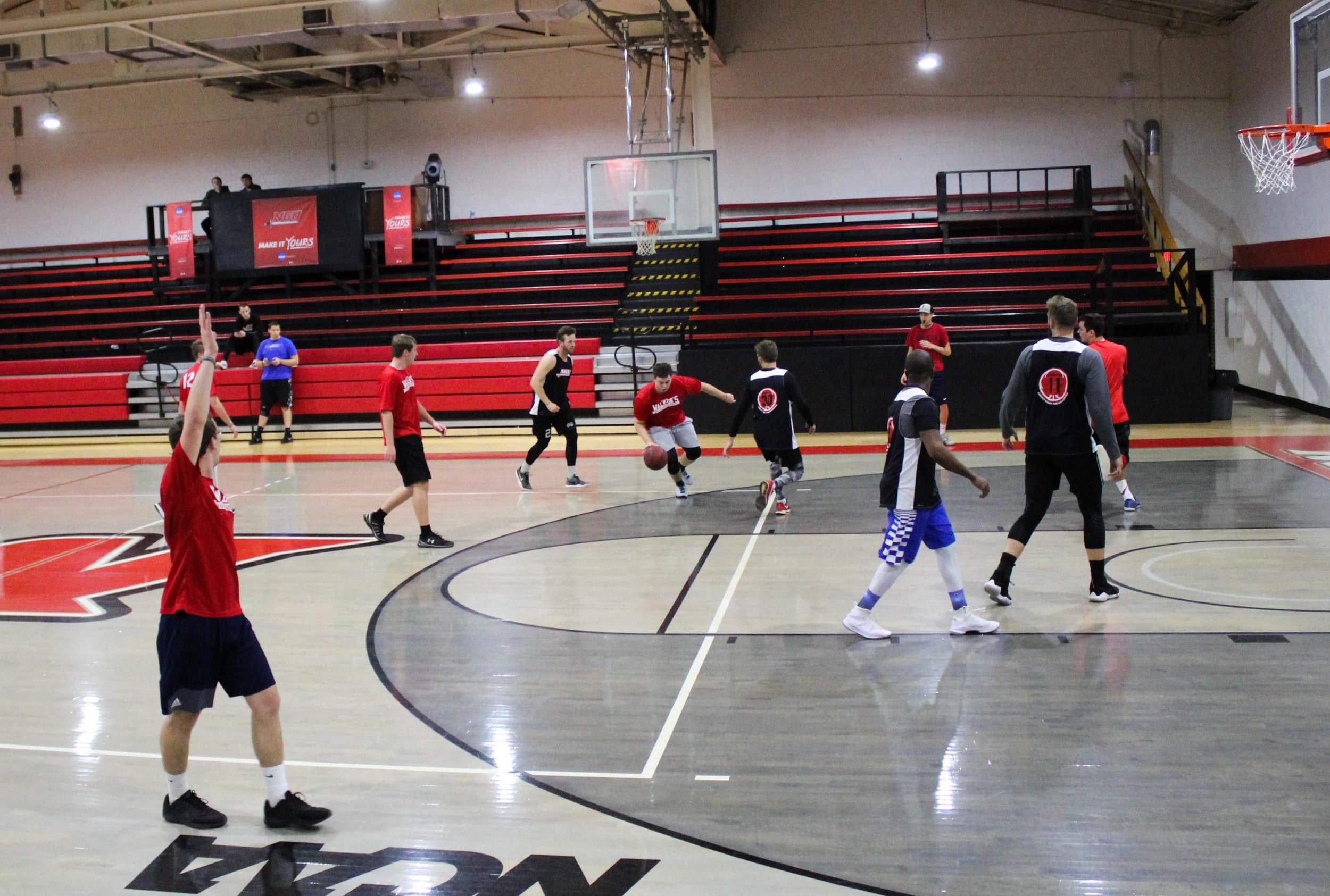 Jacob Herman drives the ball toward the middle lane while Tyler Sturgill calls out letting Herman know he is open for a pass.