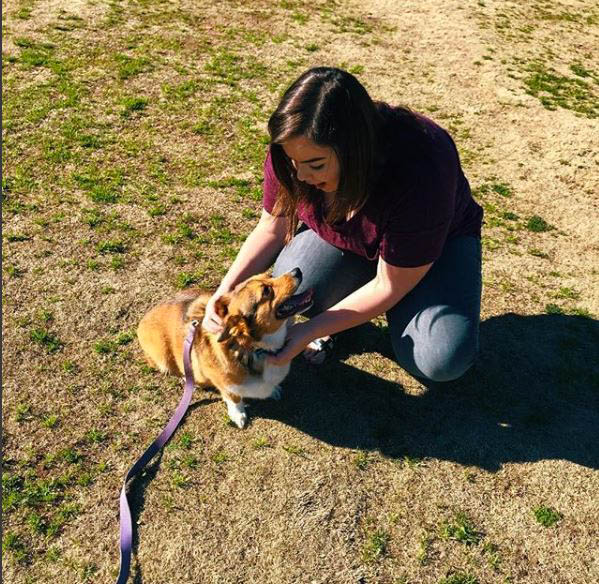 Taylor Deaton, a freshman digital media major, relieves her stress during a busy week by playing with a special visitor to the school.