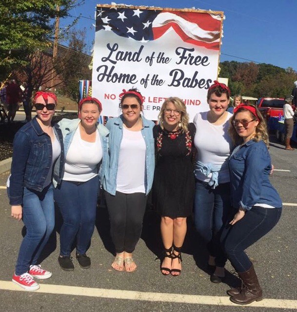 Macy McDonald, vice president of the Big Little program, and others pose at the Homecoming Parade last year.&nbsp;