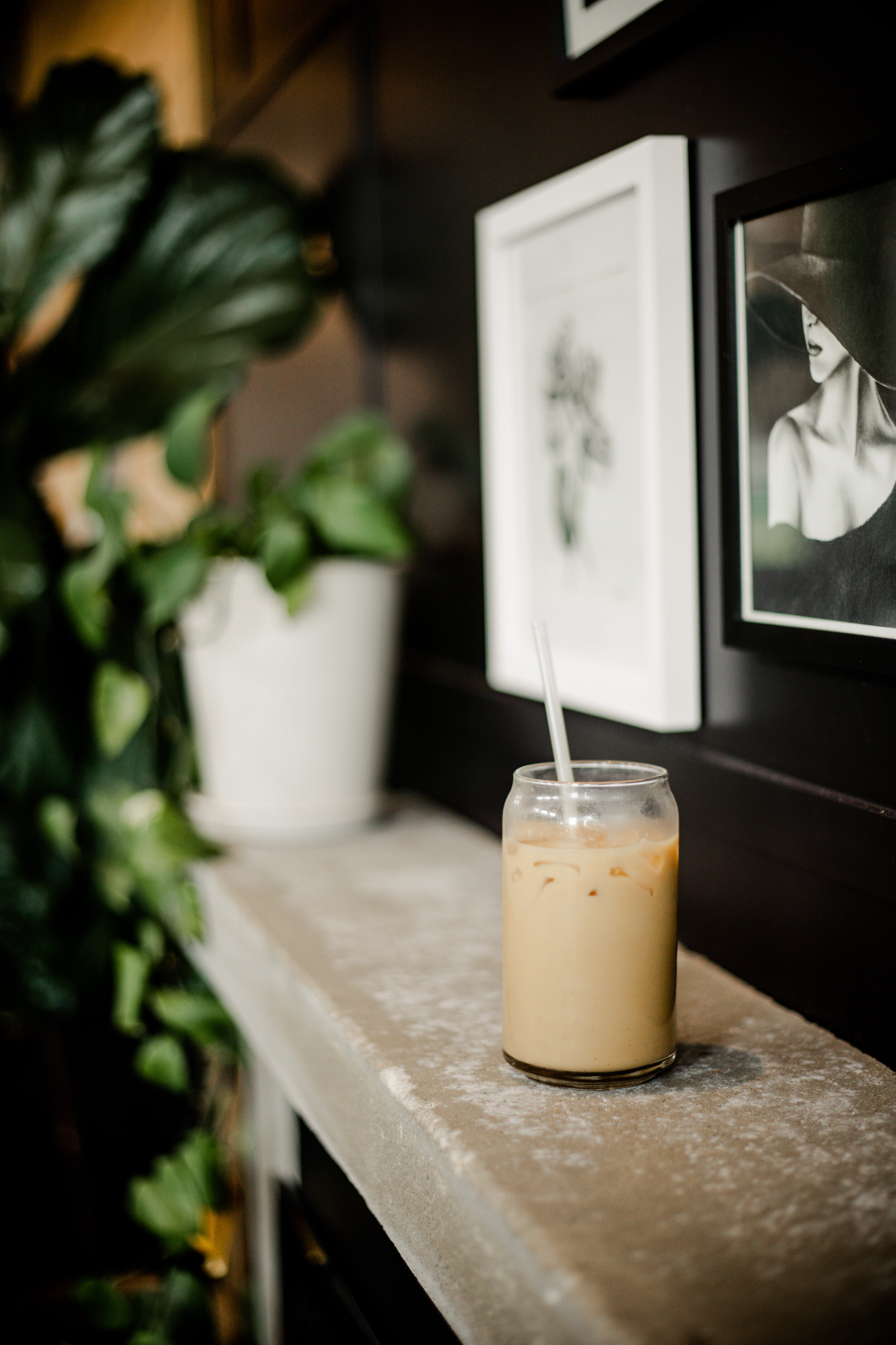 At Scandi Tiny, you can enjoy an iced latte while surrounded by drawings and paintings from local artists.