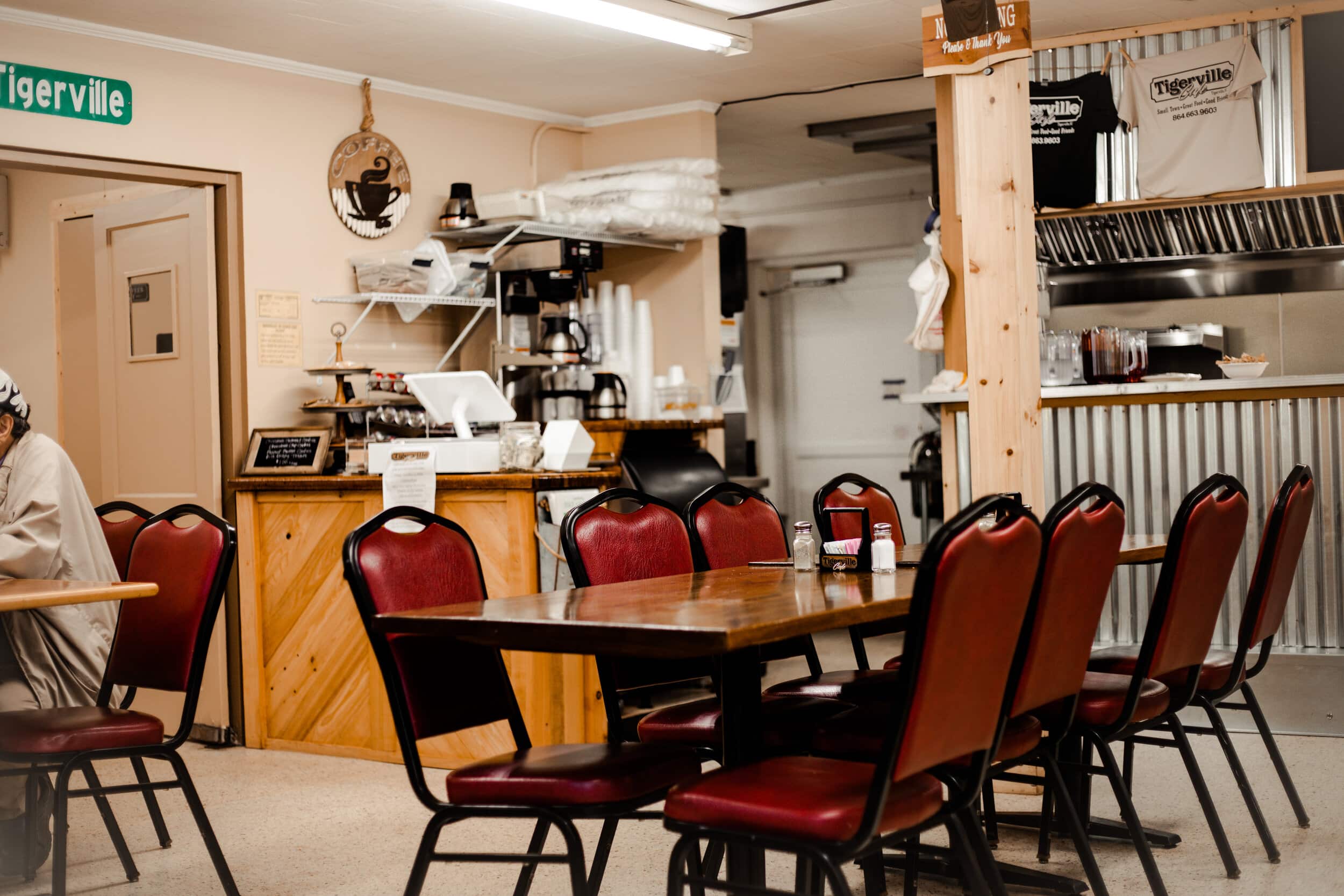Heres a look inside.  The cafe offers a warm, cozy atmosphere with a quaint, southern aesthetic.
