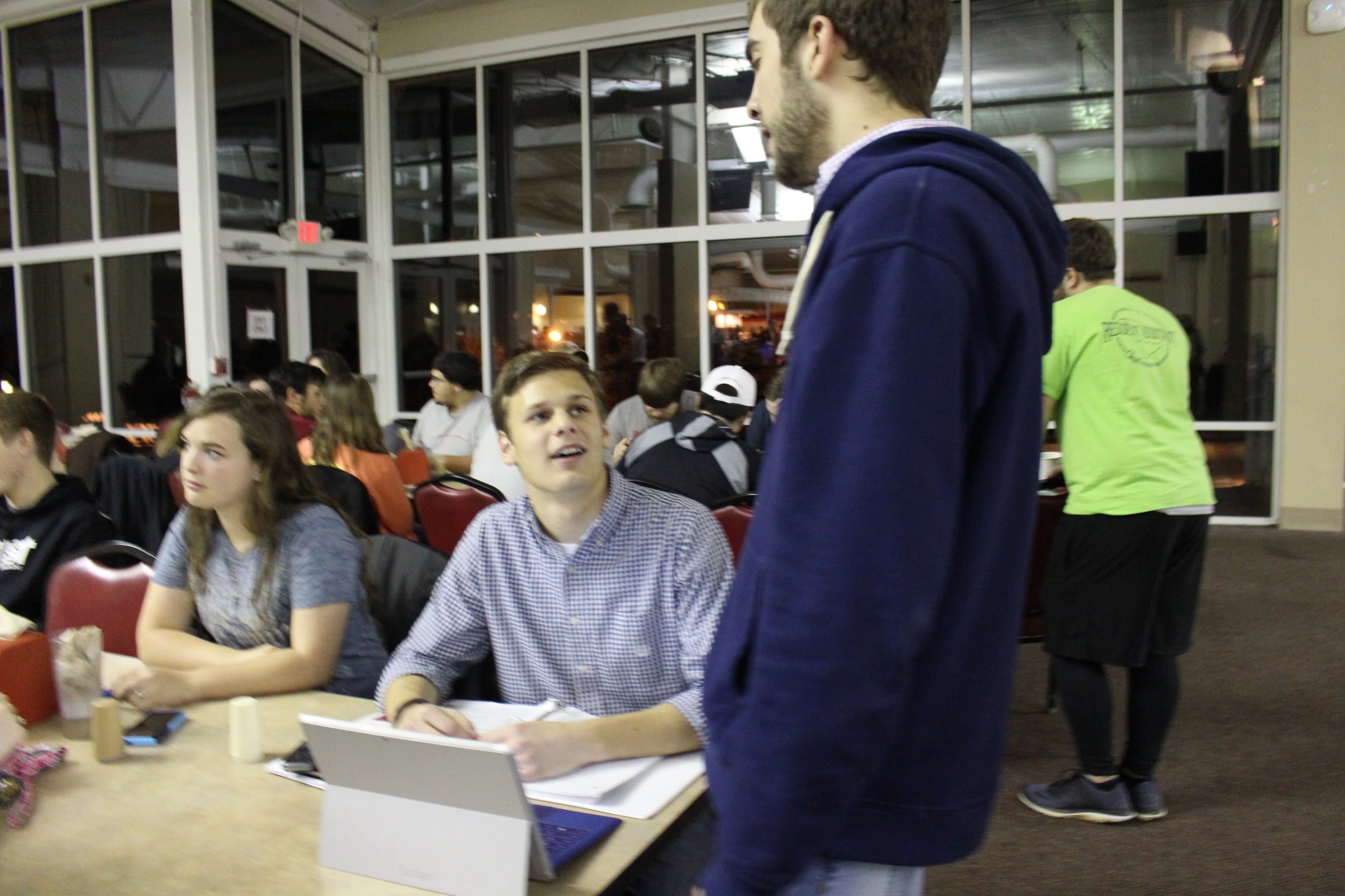 Derek Gahman and Josiah Wright studying and chatting in preparation for finals.