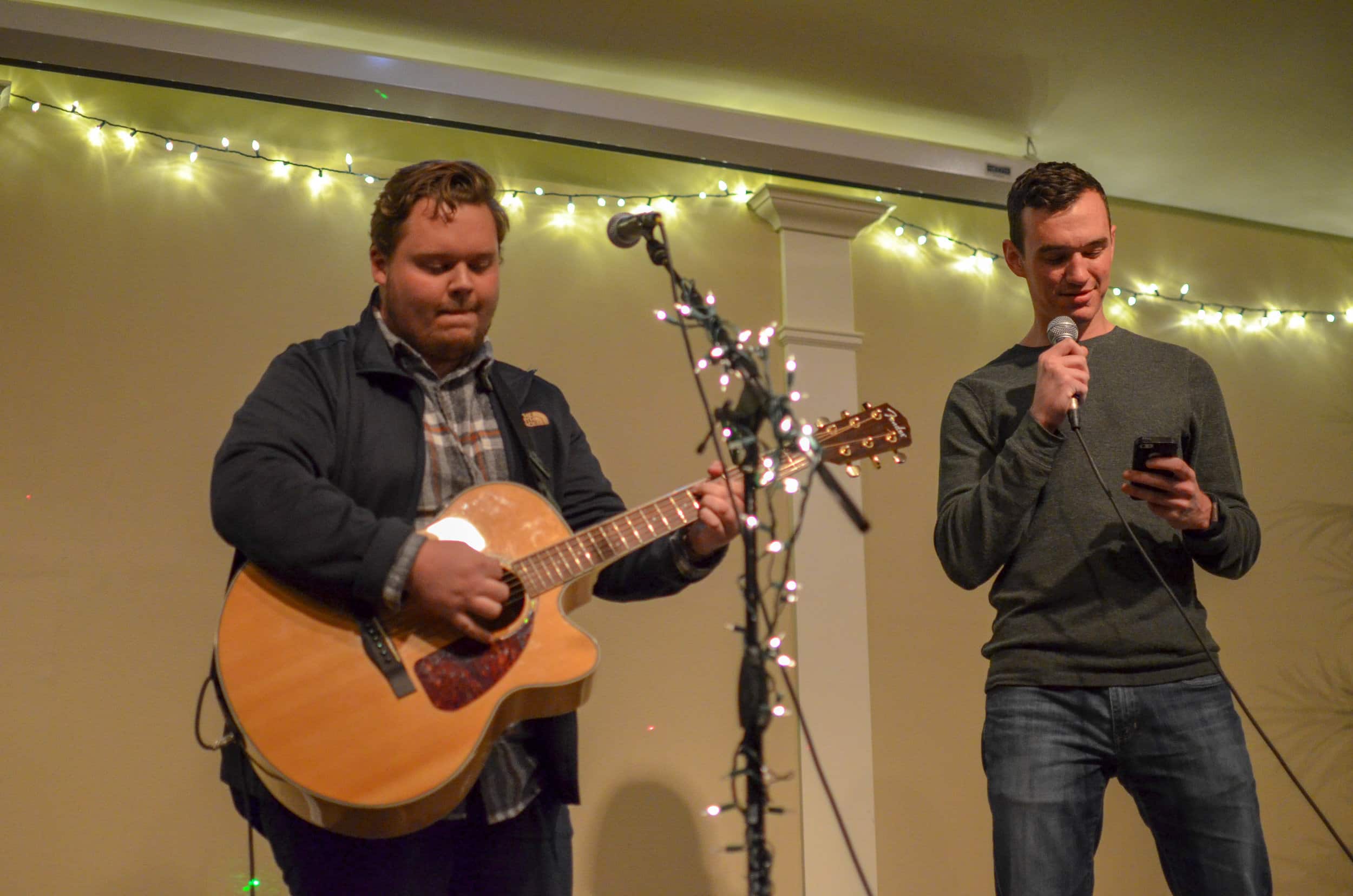 Jacob Thornton sings along with Blake Faulkner to Sailboat by Ben Rector as Faulkner plays the guitar.