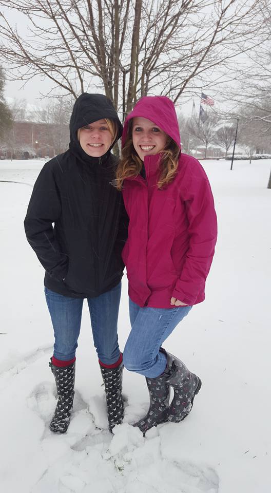 Bailey Stewart and Jessie Prescott explore the fresh snow on Friday.Photo by: Megan Conley