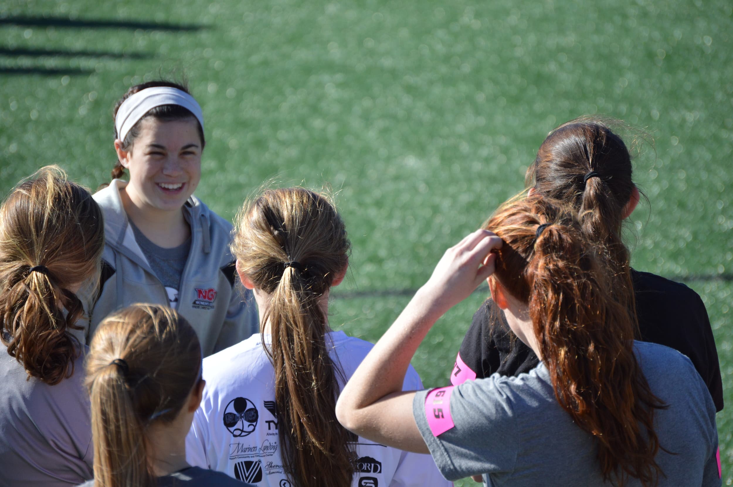 Karis Hoover, a junior right center back for the NGU women's soccer team, explained to the students what their next exercise would entail.&nbsp;