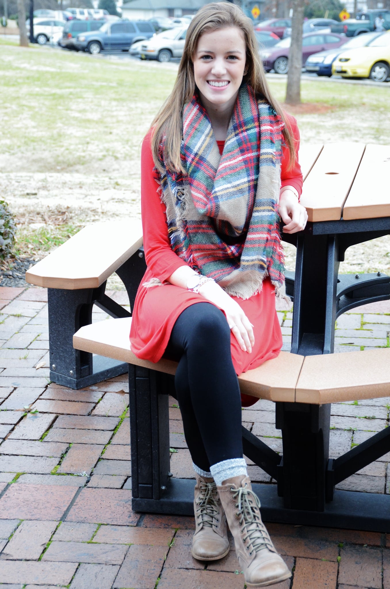 Blanket scarves are in this season for Shelby Wright as she pairs it with a casual dress and combat boots. Shelby said she recieved her dress from Southern Charm and her scarf from Girly Girl Botique.&nbsp;
