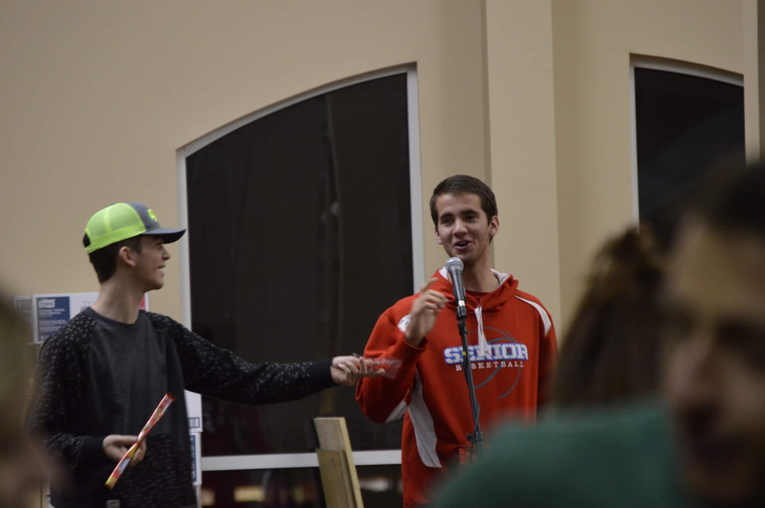 Andrew Guy and Israel Reeves ask Valentine's trivia and give prizes to the winners.