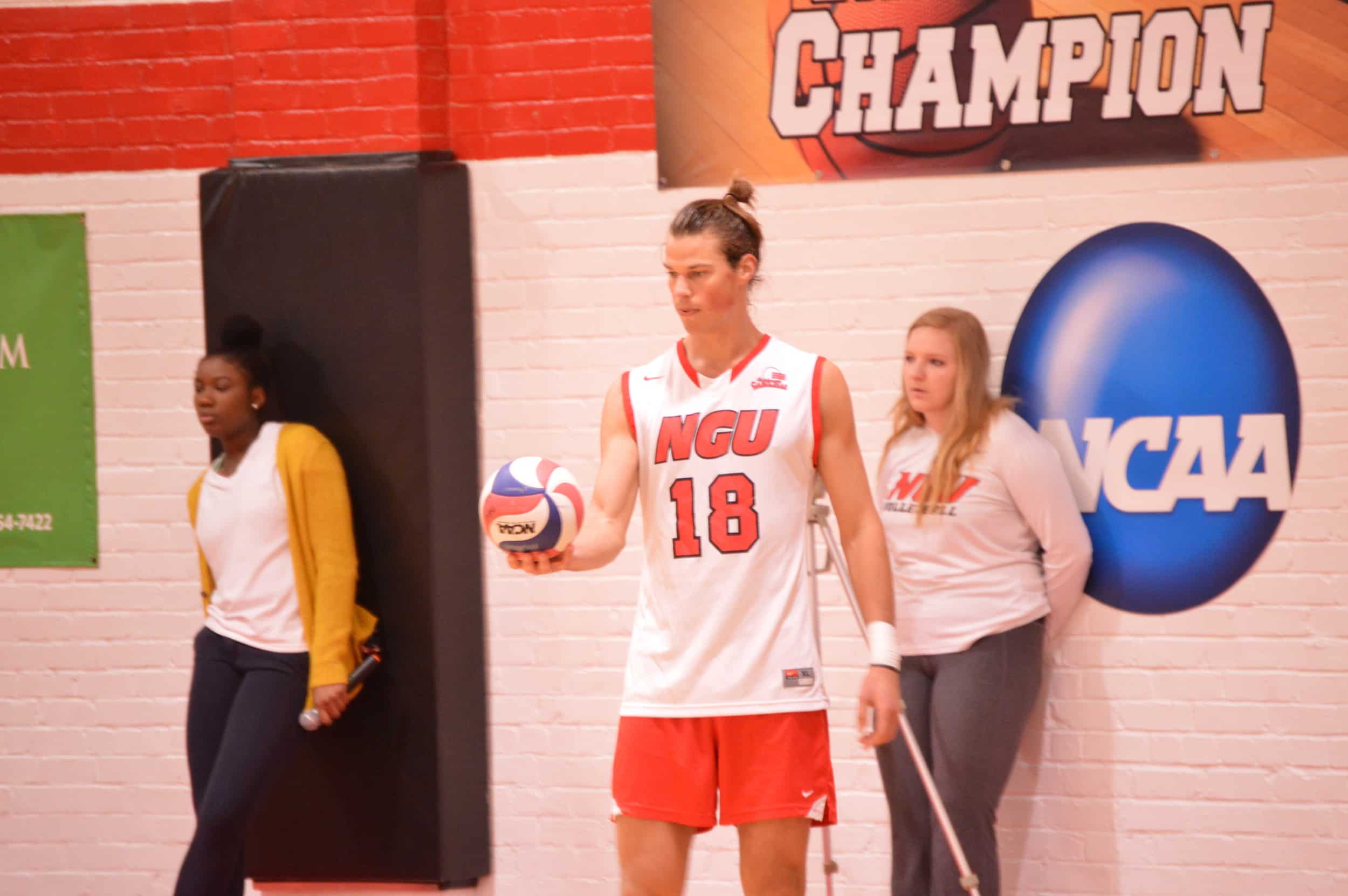 Jon Childes prepares to serve the ball to the other team.