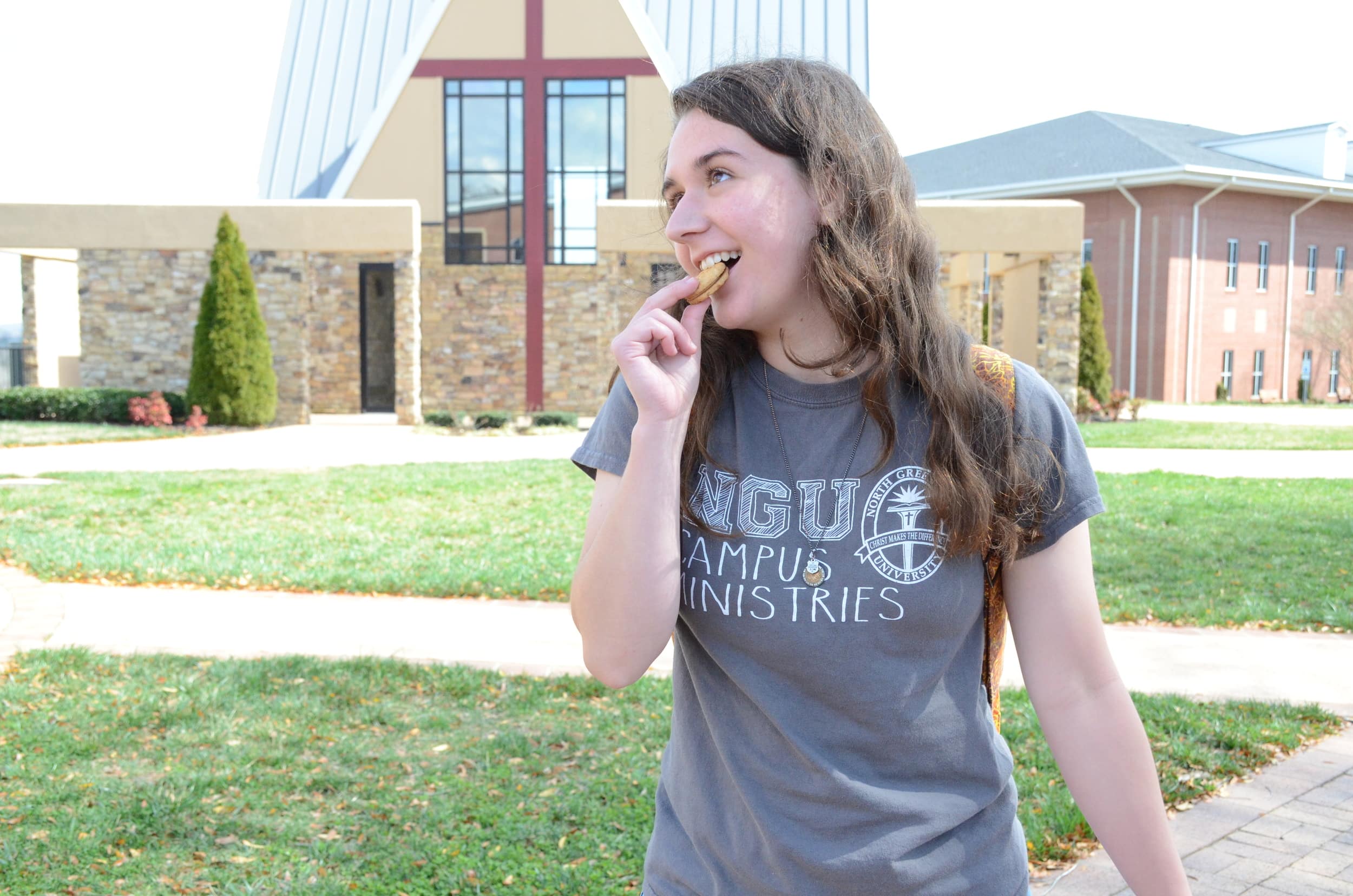 Elizabeth Nelson enjoys her peanut butter cookies while walking to and from class.&nbsp;