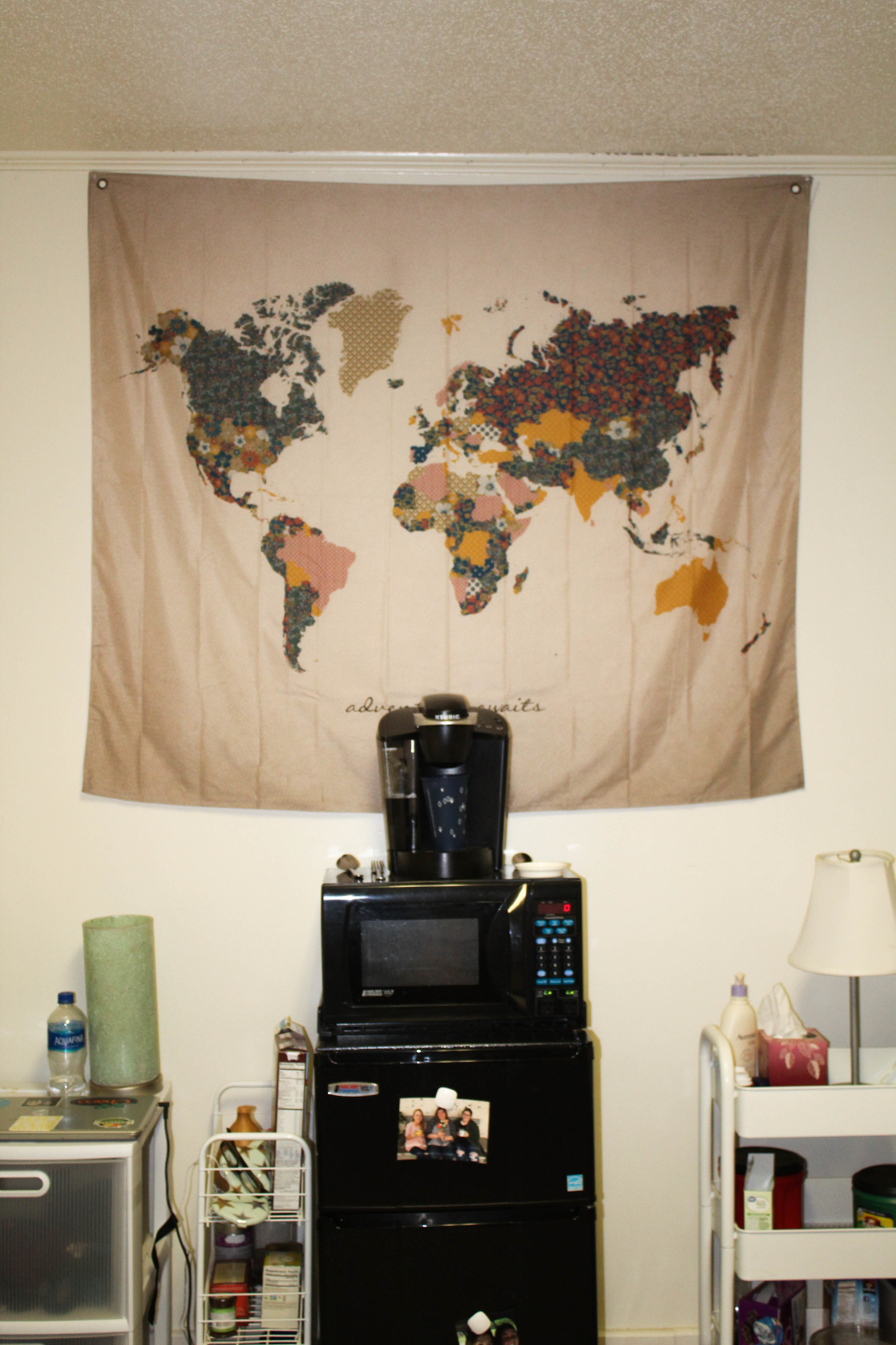 Kaitlyn Coleman, junior, has a tapestry hanging behind her coffeemaker, showing off her personal style.