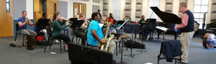 The Jazz Band concentrates on Charlie Parker's conducting to practice for perfection for the upcoming concert. Photo courtesy of Shelby Snigar.