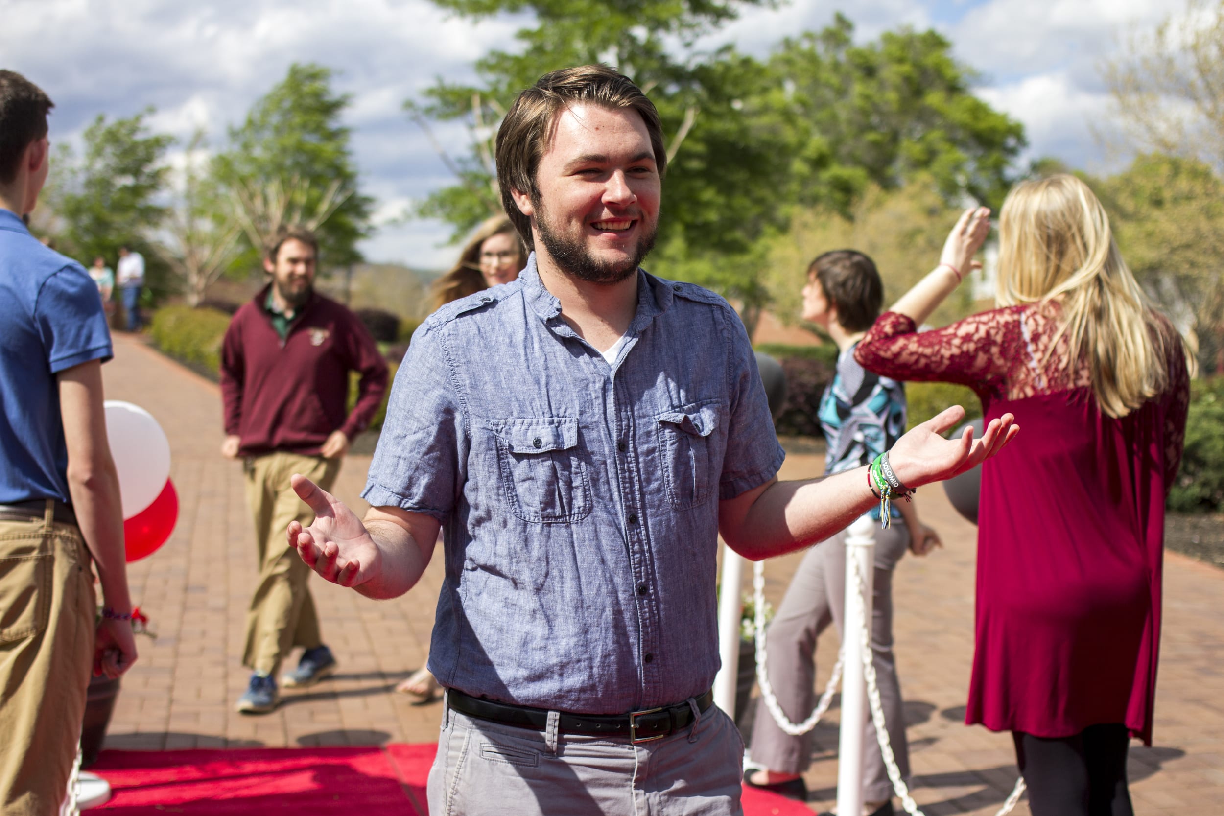 Max Millsaps laughs as he was told to strike a pose. Shrugging his shoulders, he acts as if a red carpet event is just another normal day in the life of Max Millsaps.&nbsp;