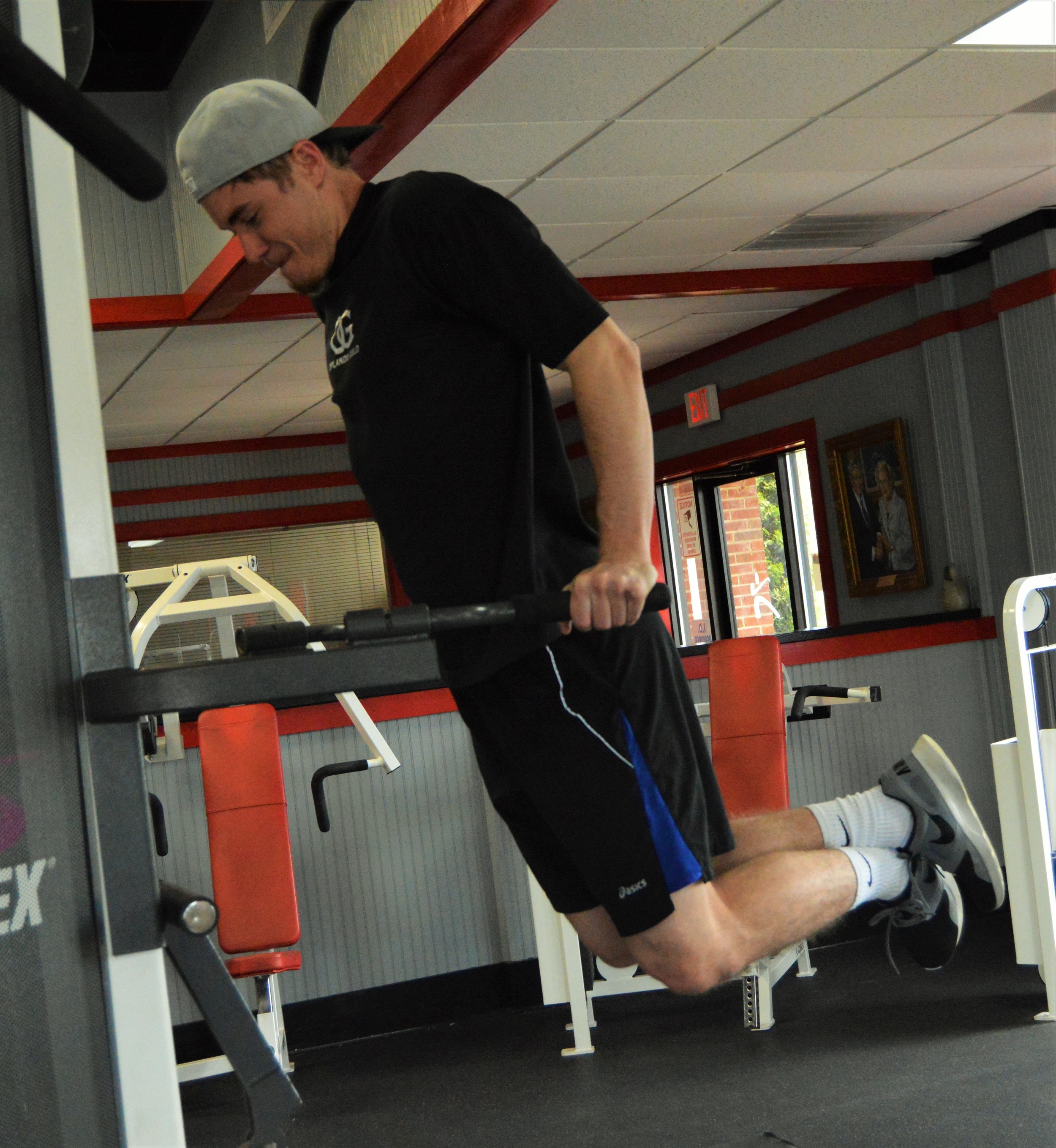 The dip machine works your triceps. Keep your legs up and your core engaged!&nbsp;