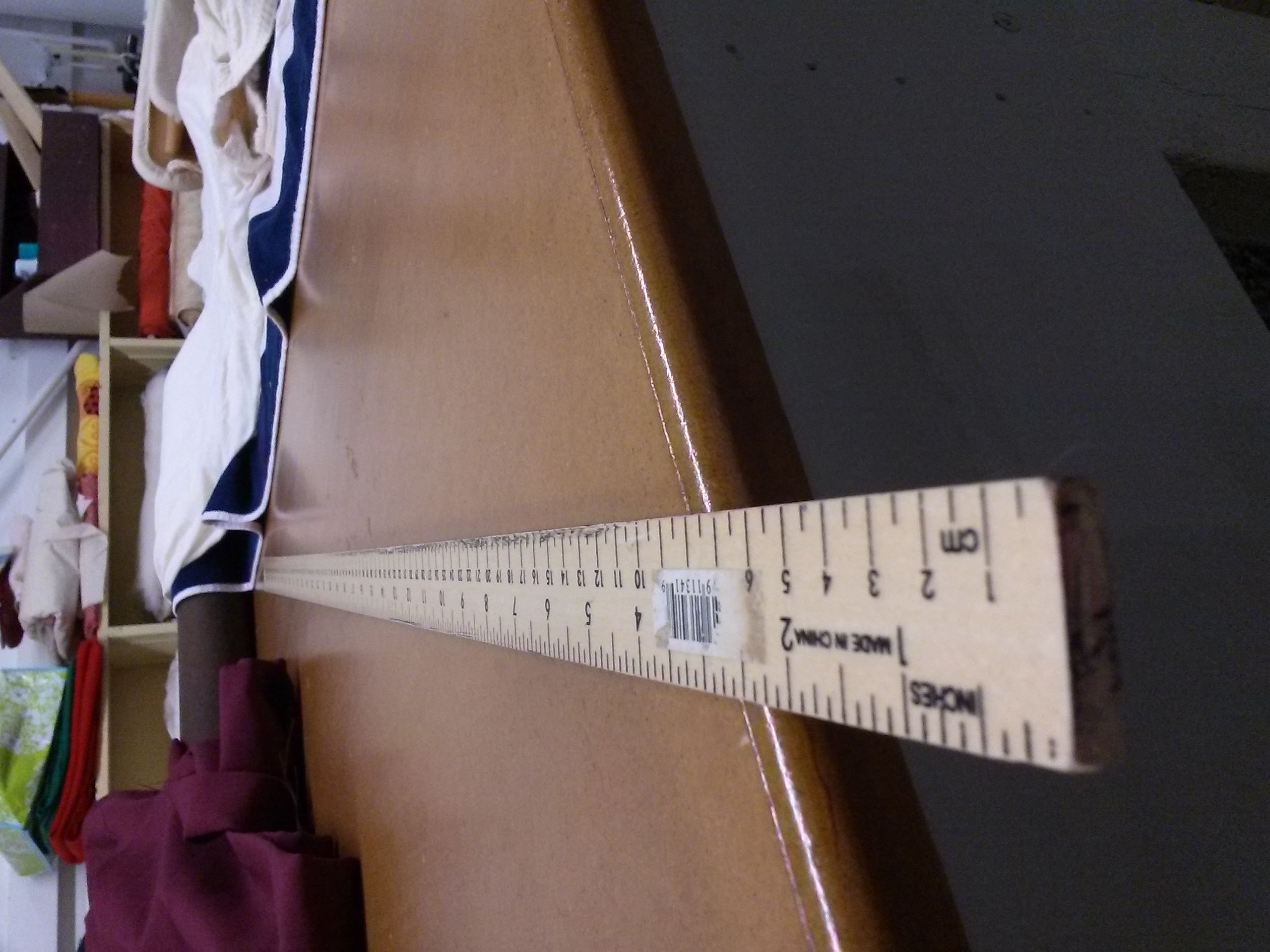  As a "stitcher," or seamstress, Whitley uses tools such as this table and measuring stick to create countless costumes.&nbsp; 