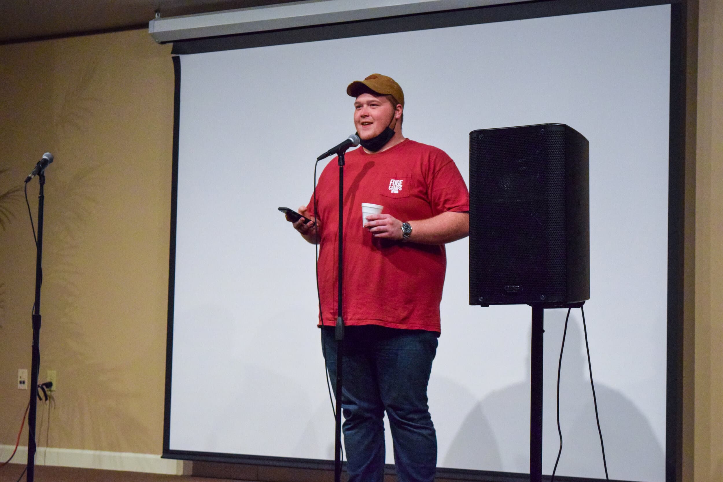 Blake Patton, graduate assistant for Student Activities, is the MC at Coffee House.