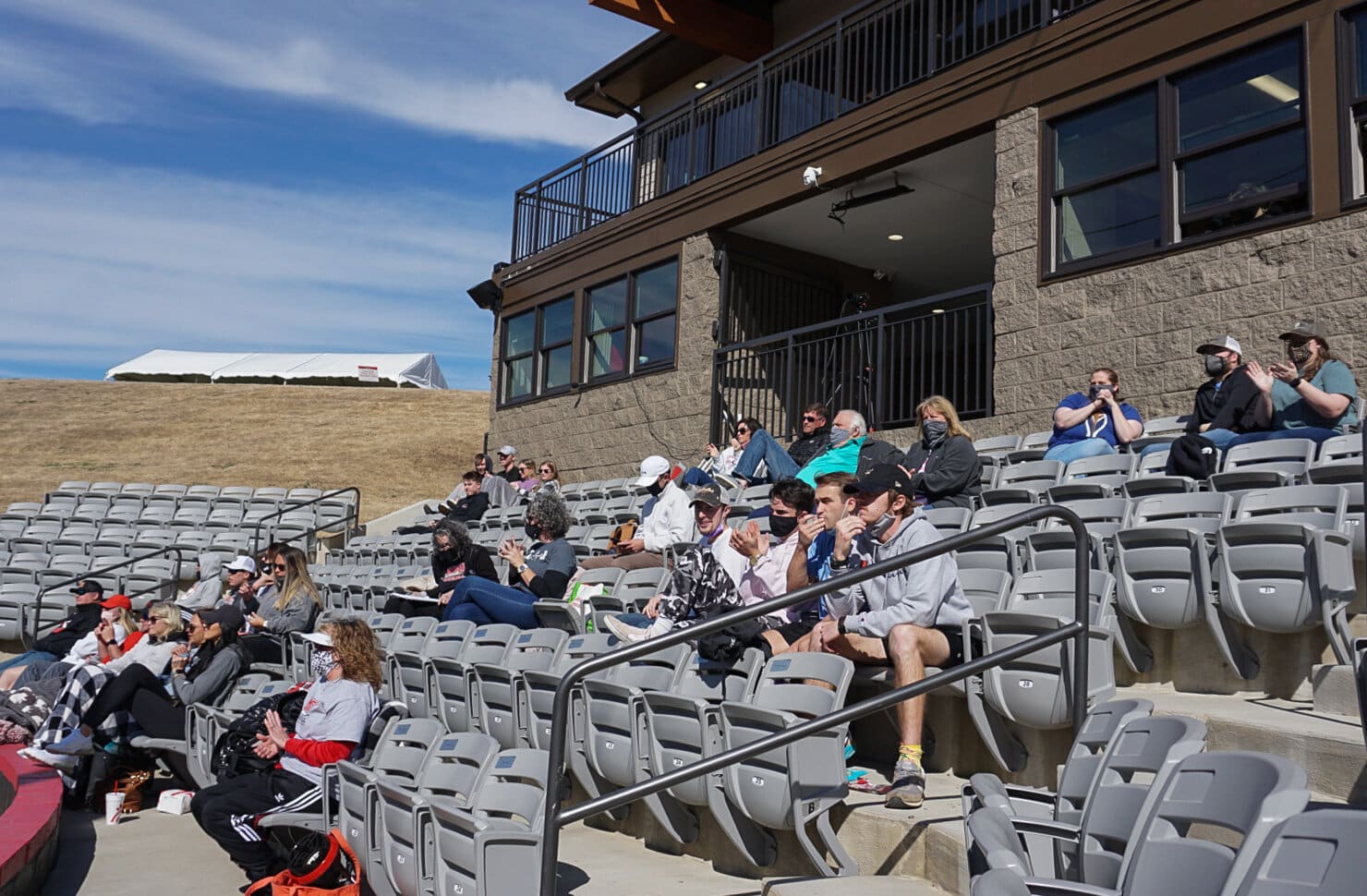 Fans and students cheer on the Crusaders before heading off on spring break.