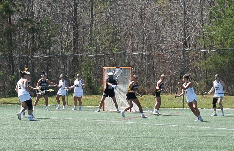 Rachel Kellogg, 4, fifth year, gets closer to the middle to score a goal for the Crusaders.