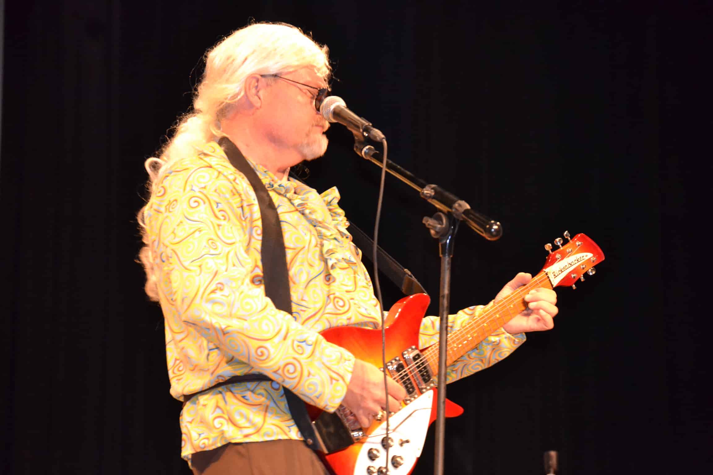  Tony Beam, along with three other faculty, took the stage and sang popular songs for the audience's enjoyment.&nbsp; 