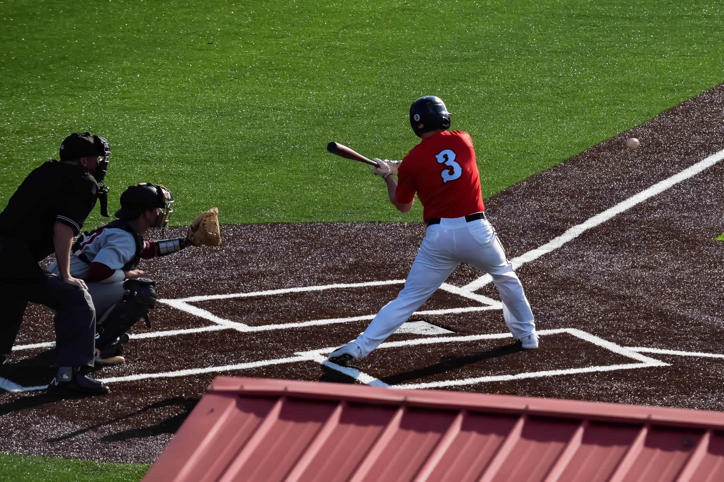 #3 Ryan Brown keeps his eyes on the ball as he plans to hit a grand slam.