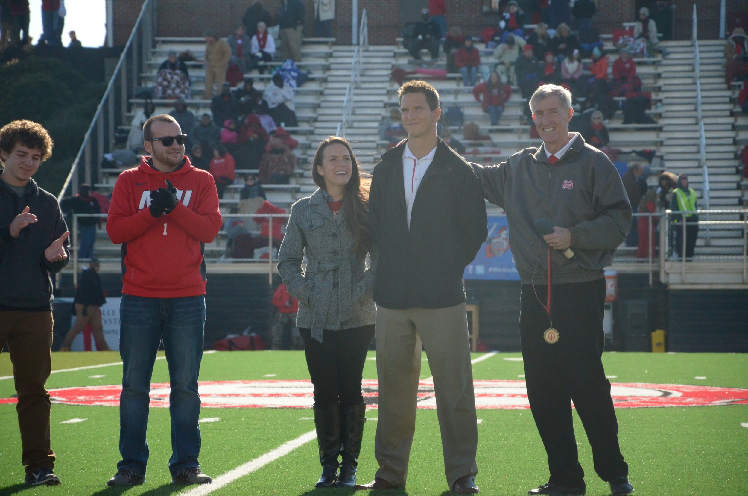  The President of North Greenville, Jimmy Epting, is ready to present a medal to NGUs head tennis coach, Tomas Kurhajec, for entering NGU's athletic hall of fame. 