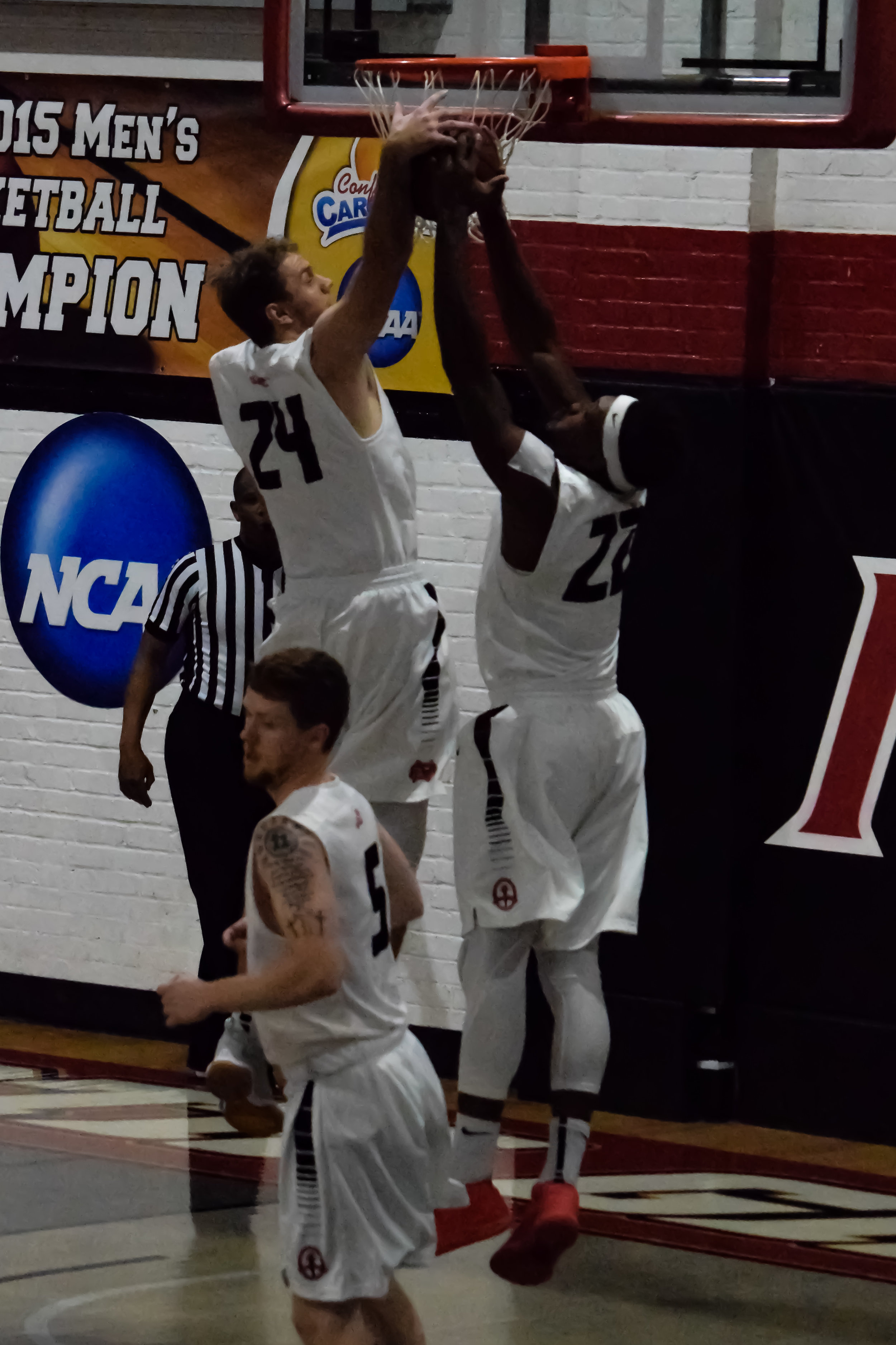 NGU's #24 Tommy Wade and #22 Roderick Howell team up to prevent the team from scoring.