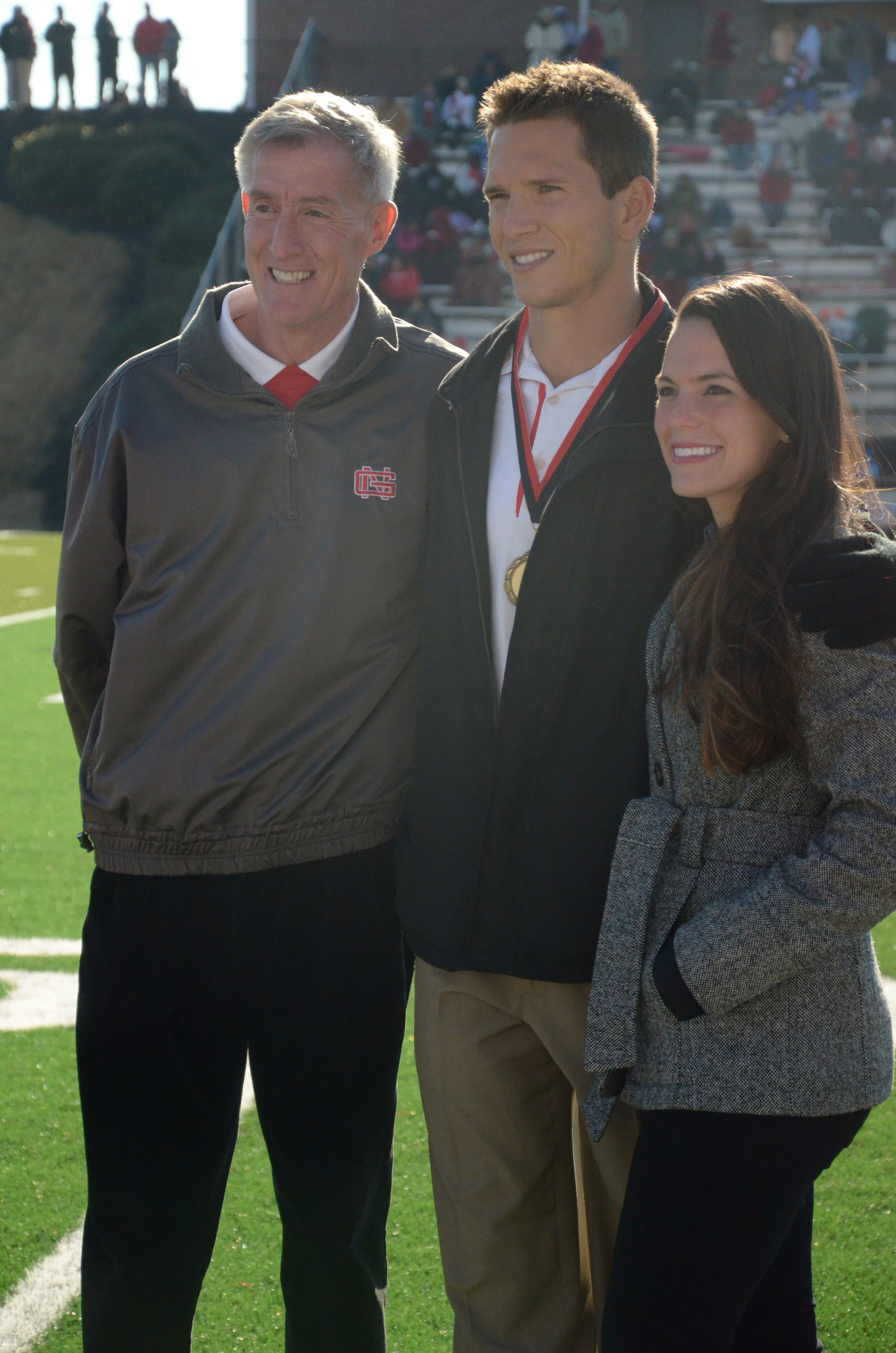  Epting, Kurhajec, and his wife Hannah, pose for some pictures. 