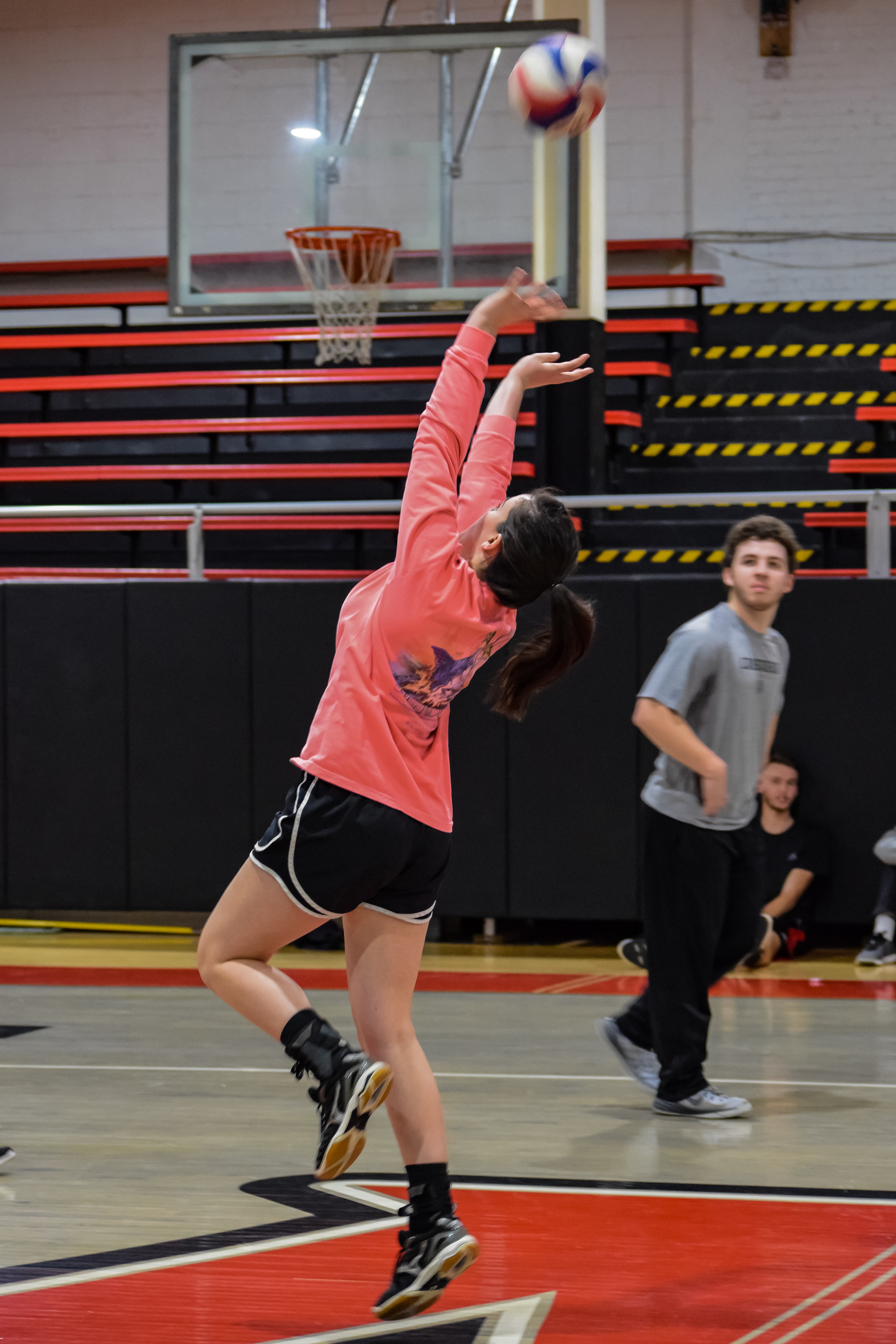 Kayla Ward shows off her gracefulness as she keeps the ball from hitting the floor.