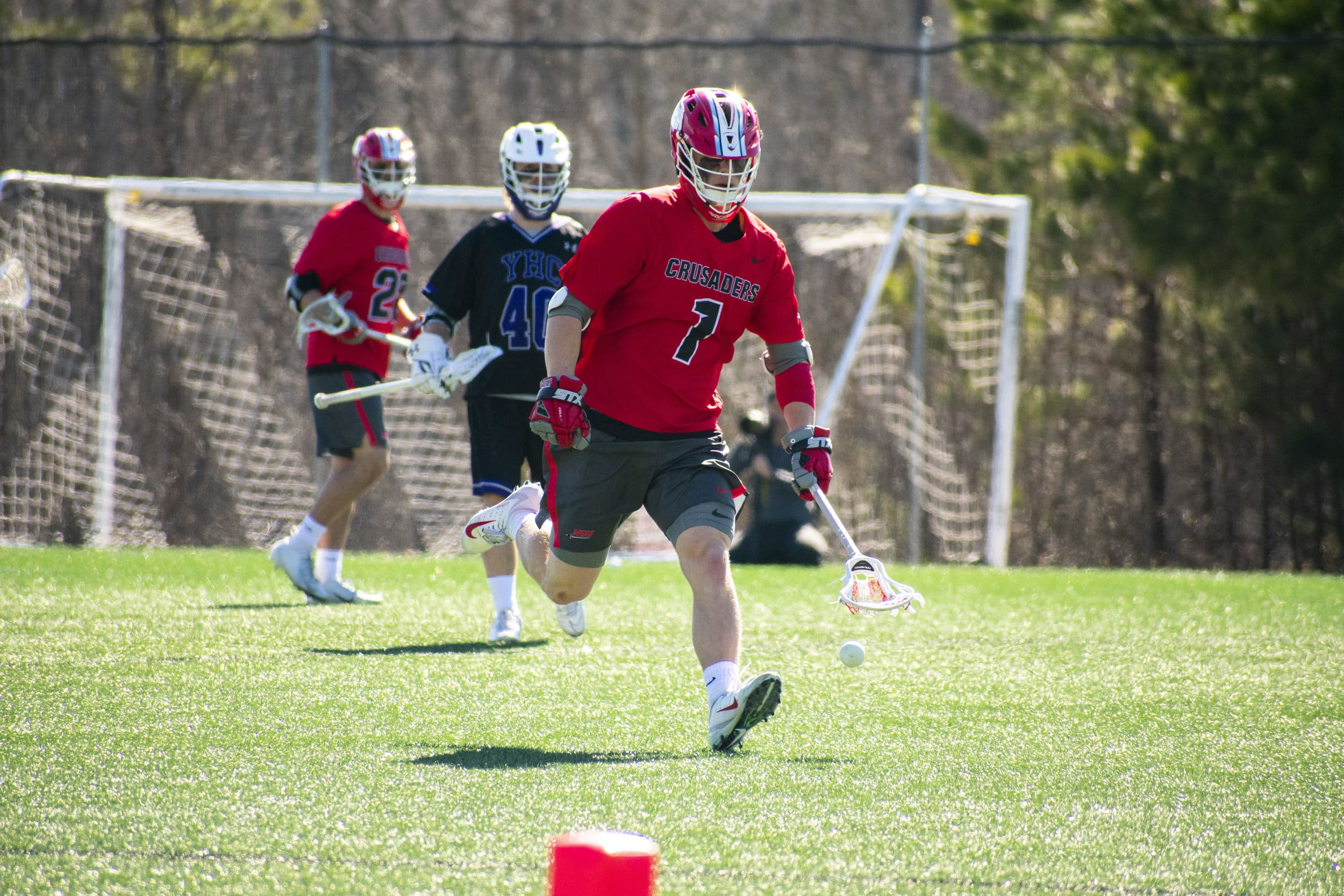 Junior Fletcher Steveson (1) tries to pick up the ball.