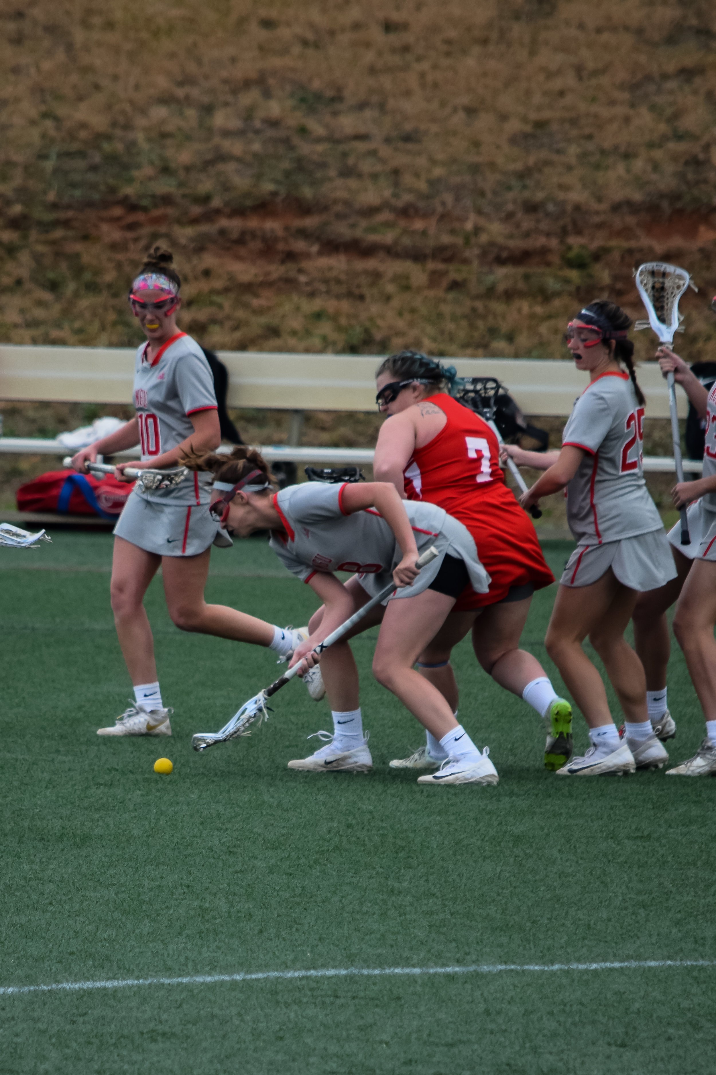 #8 Candace Petit, #10 Emily Colson and #25 Christy Beaman work together to prevent the other team from gaining possesion of the ball.&nbsp;