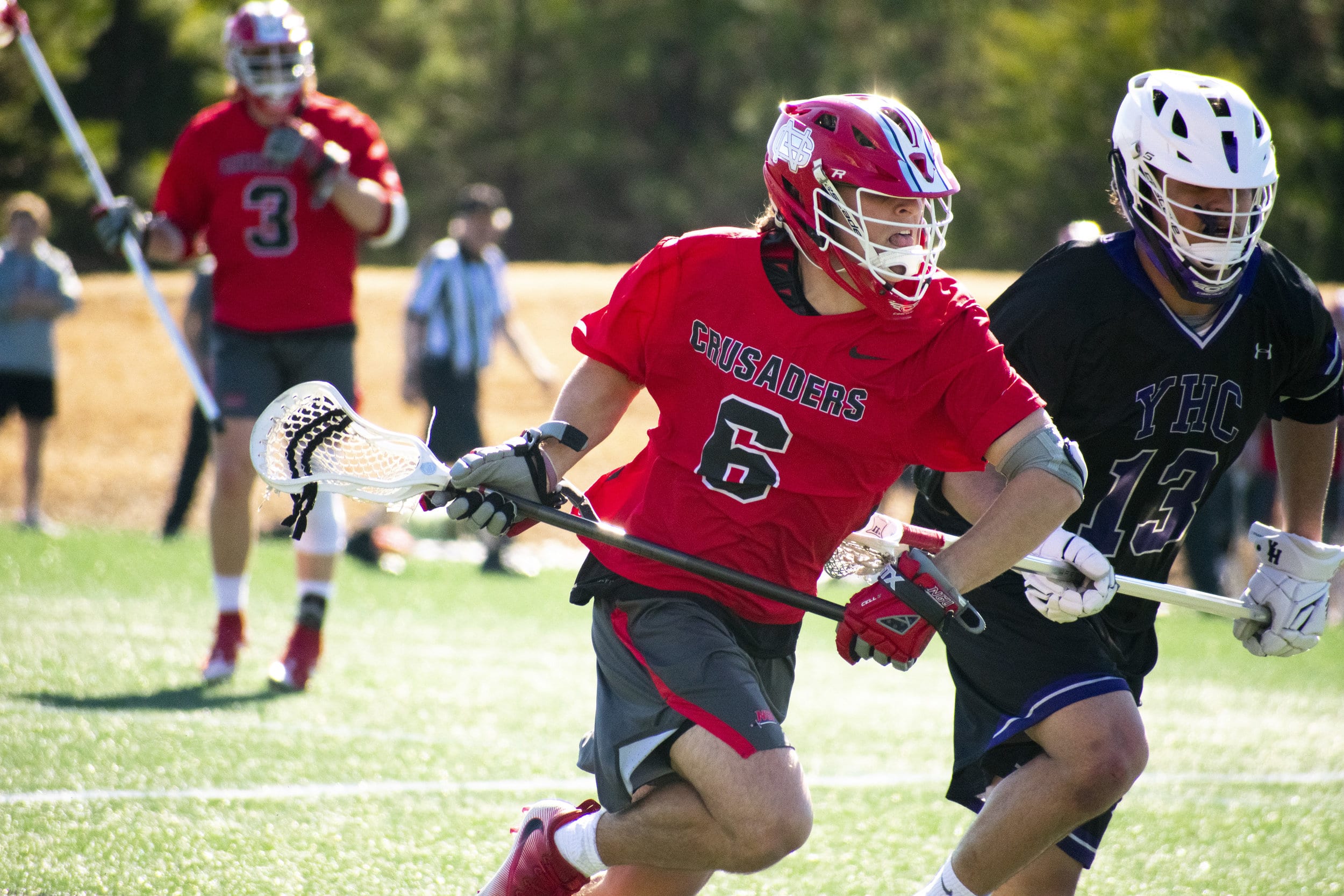 Senior Alex Proly (6) runs to get the ball.