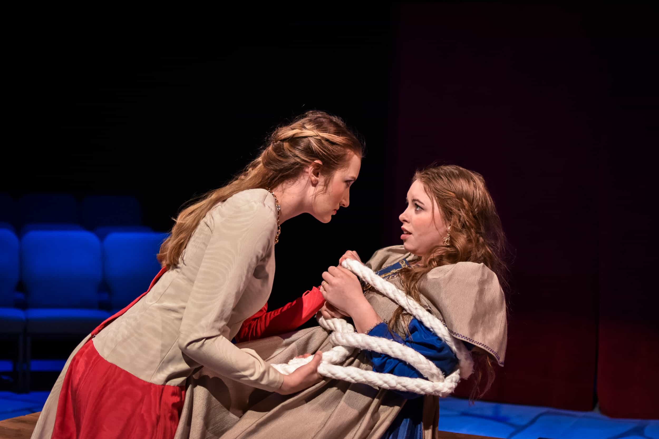 Kate torturing her sister, tying her hands, asking which suitor she likes best and teasing her about her dress. Taming of the Shrew - 2019