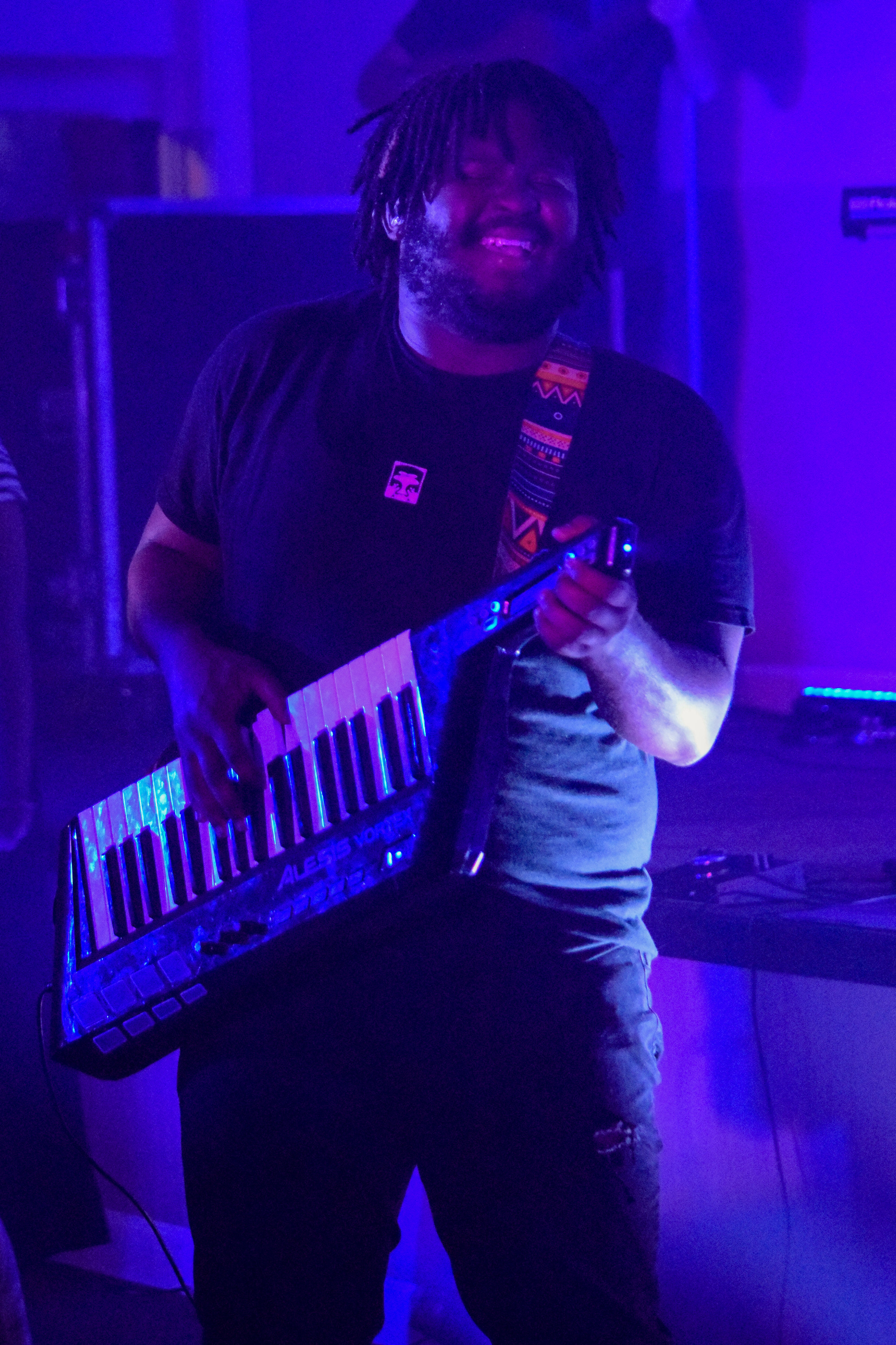 Perdue rocks it out on the keytar during the service.