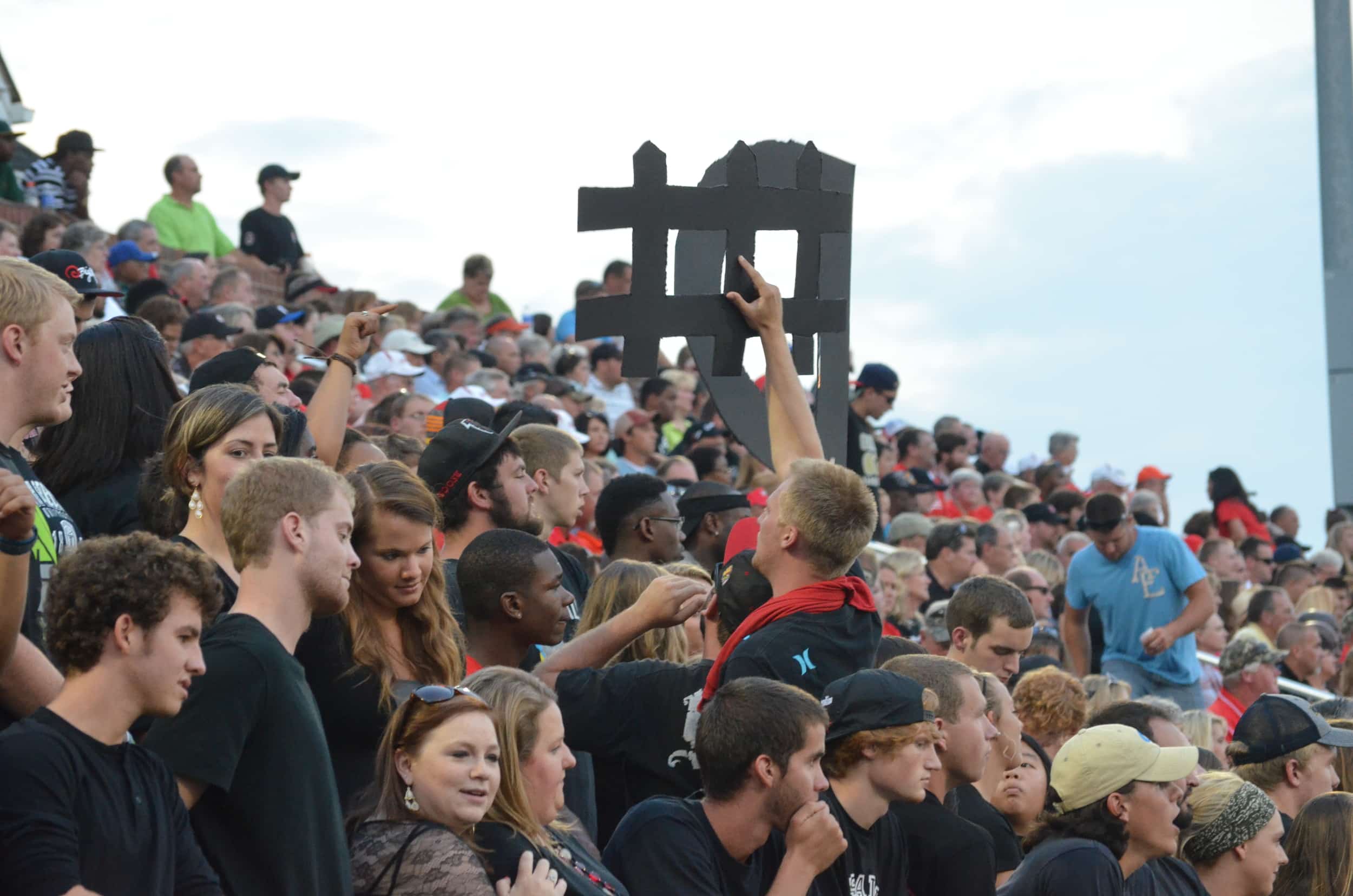  The crowd is ready to cheer on the NGU Crusaders by reminding them what it's all about: Defense 