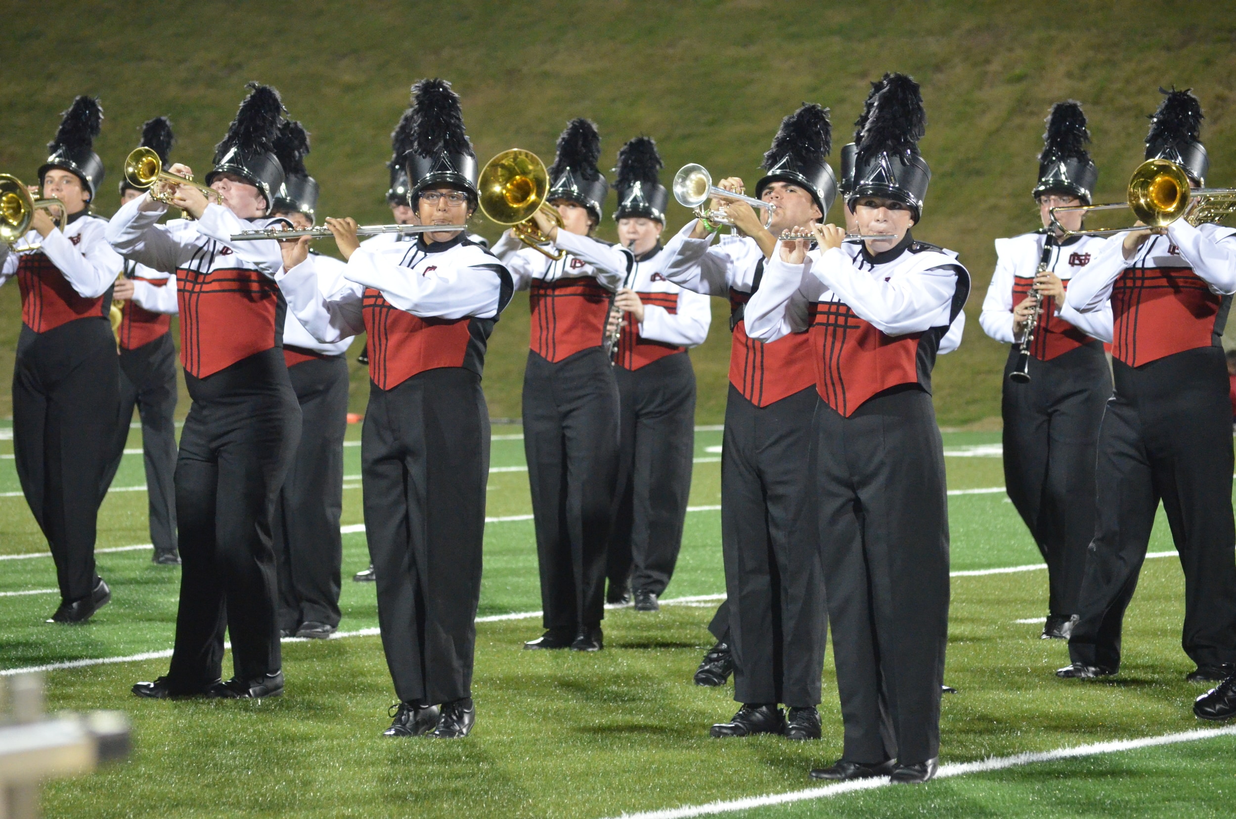  The band plays current hit songs during the half time show 