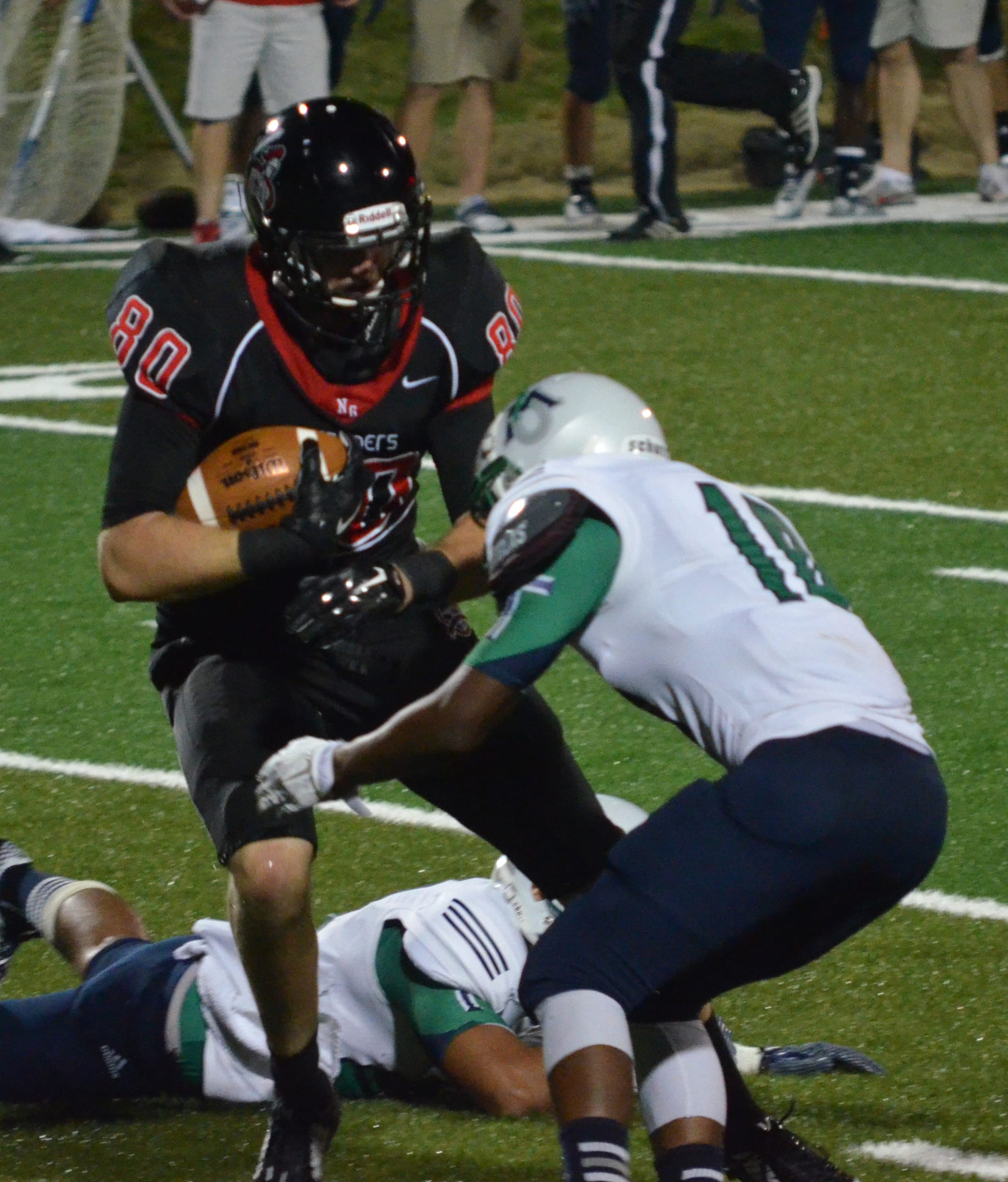  Tight End, Brock Frisbee, dodges what could have been a nasty tackle 