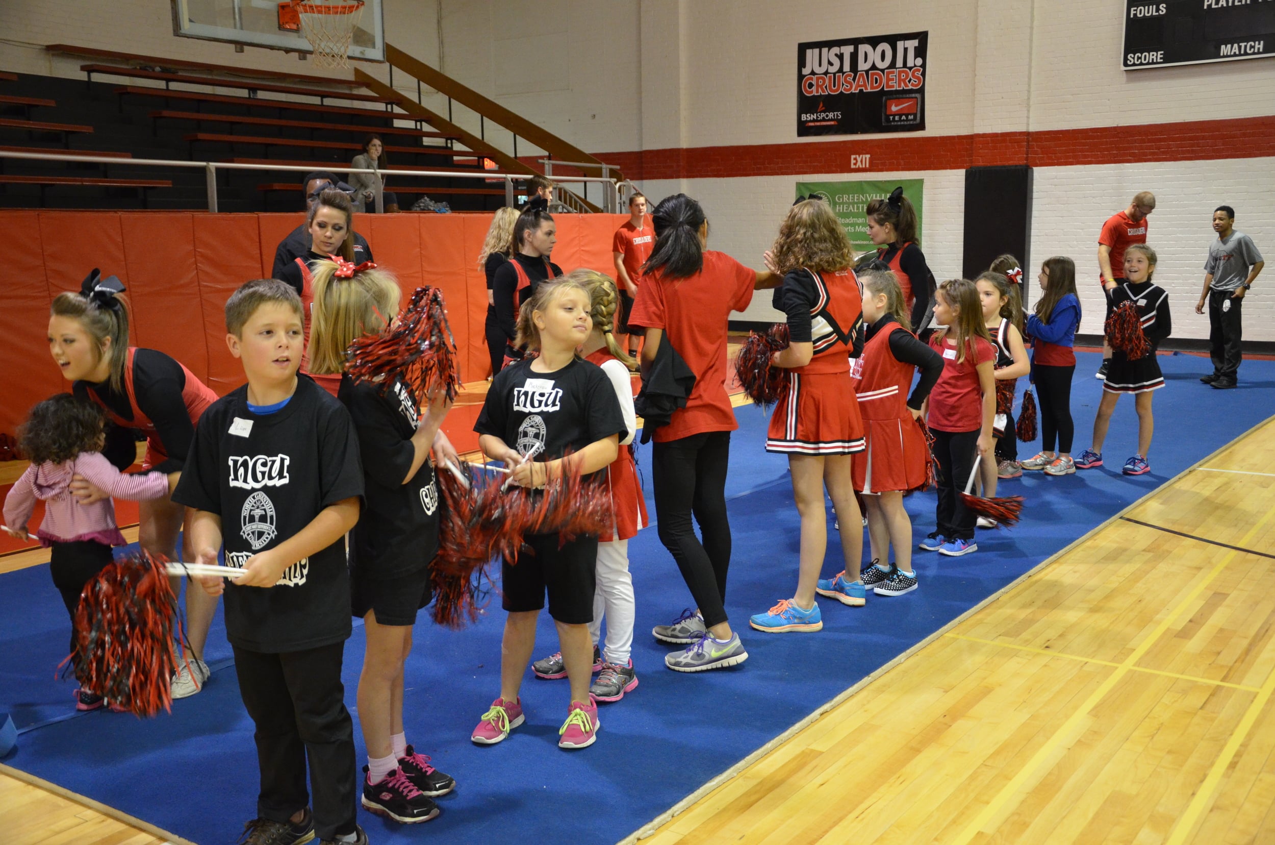  The kids line up to start something new at NGU's cheer camp last weekend. 