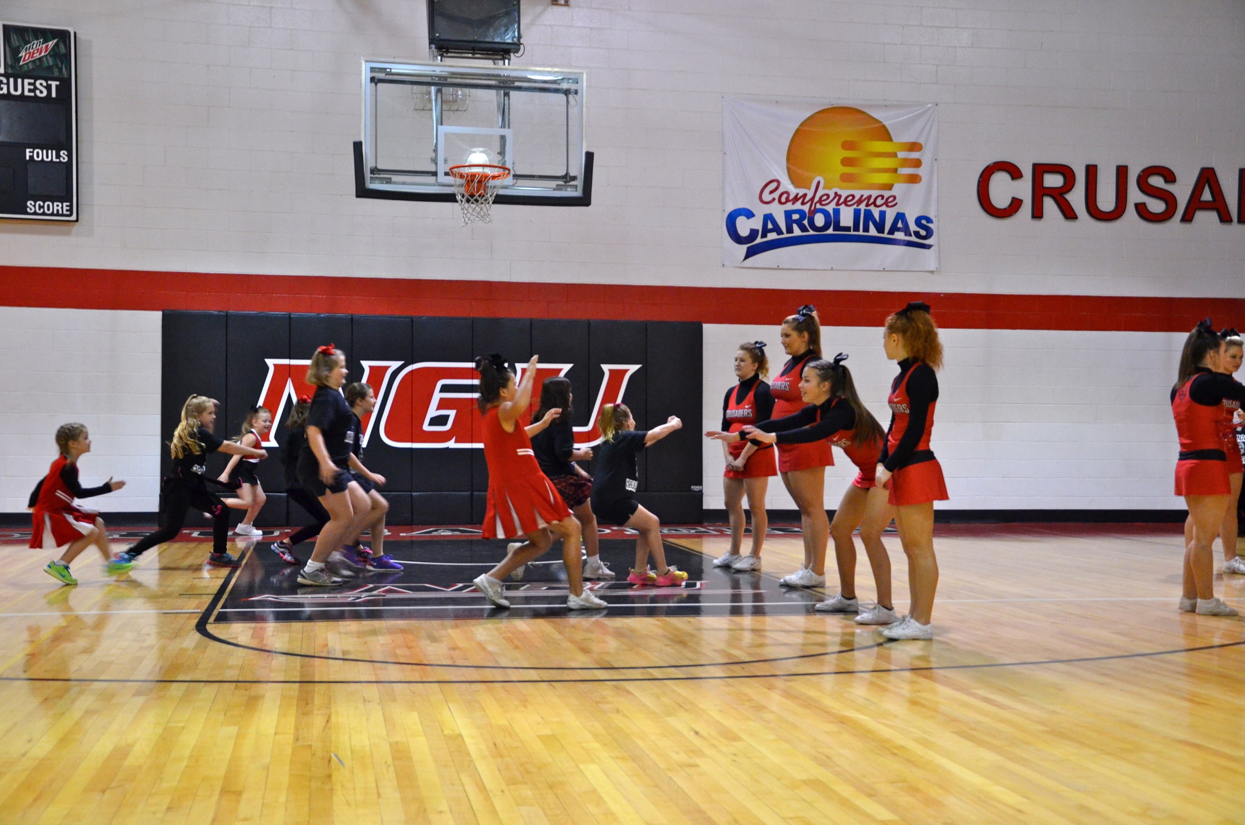  The players come to a sudden halt as "Red Light!" is shouted during cheer camp held on the NGU campus October 4. 