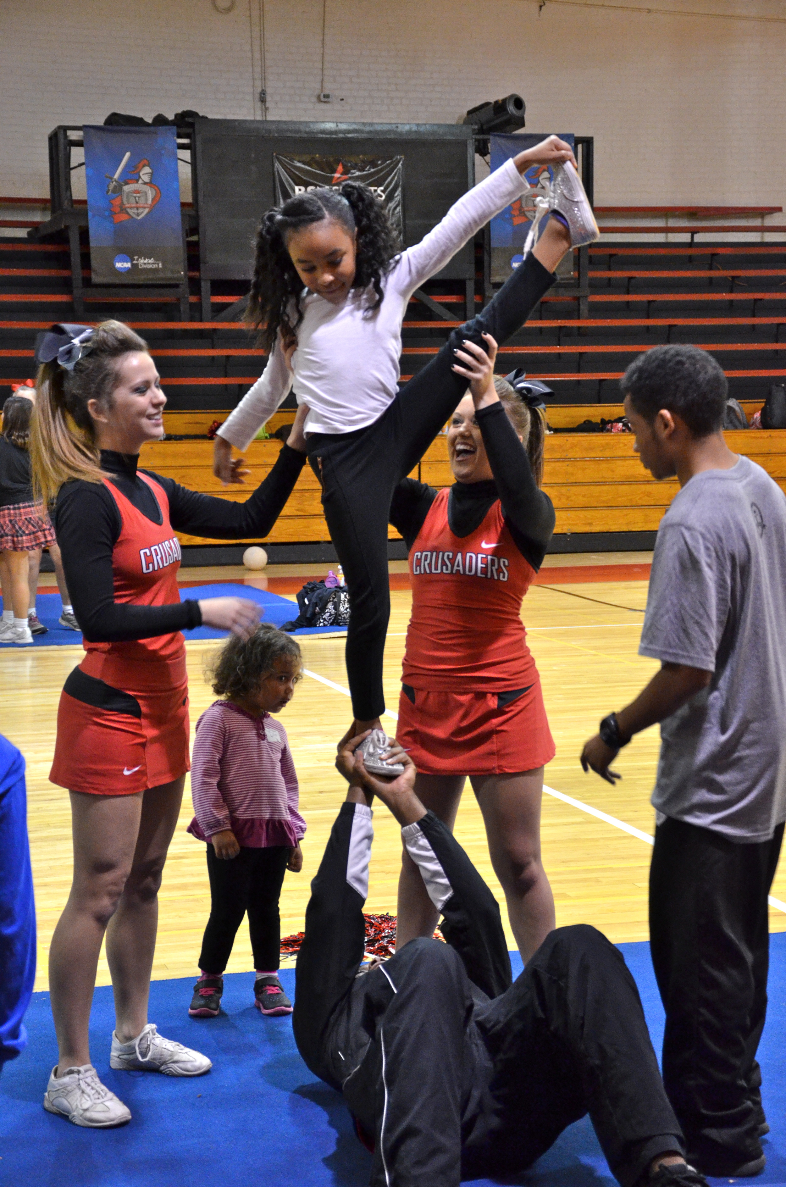  This mini-Crusader is going above and beyond to show off her skills at Crusader Cheer Camp last weekend. 