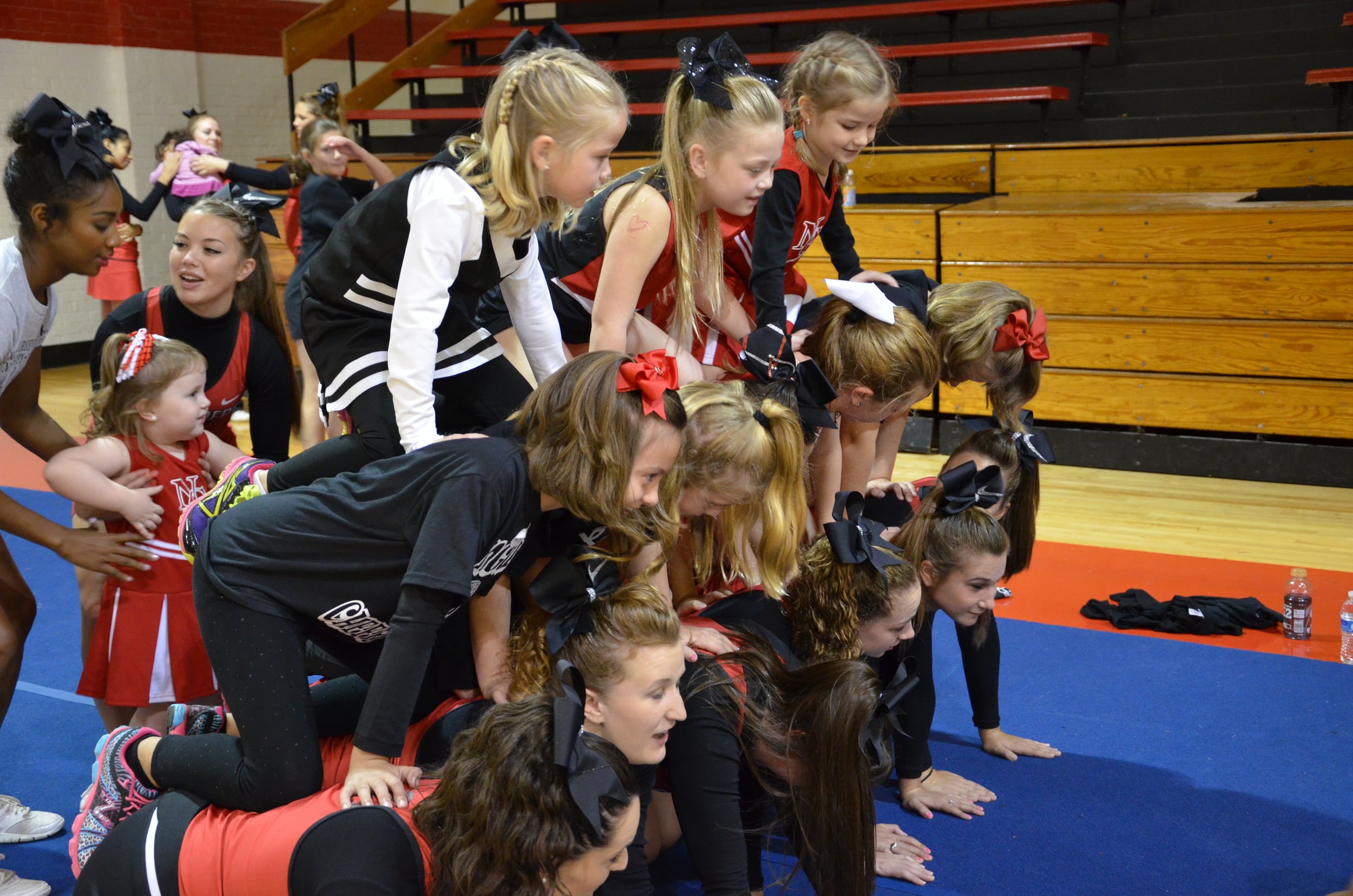  The team works together as they climb to form a good-looking pyramid. 