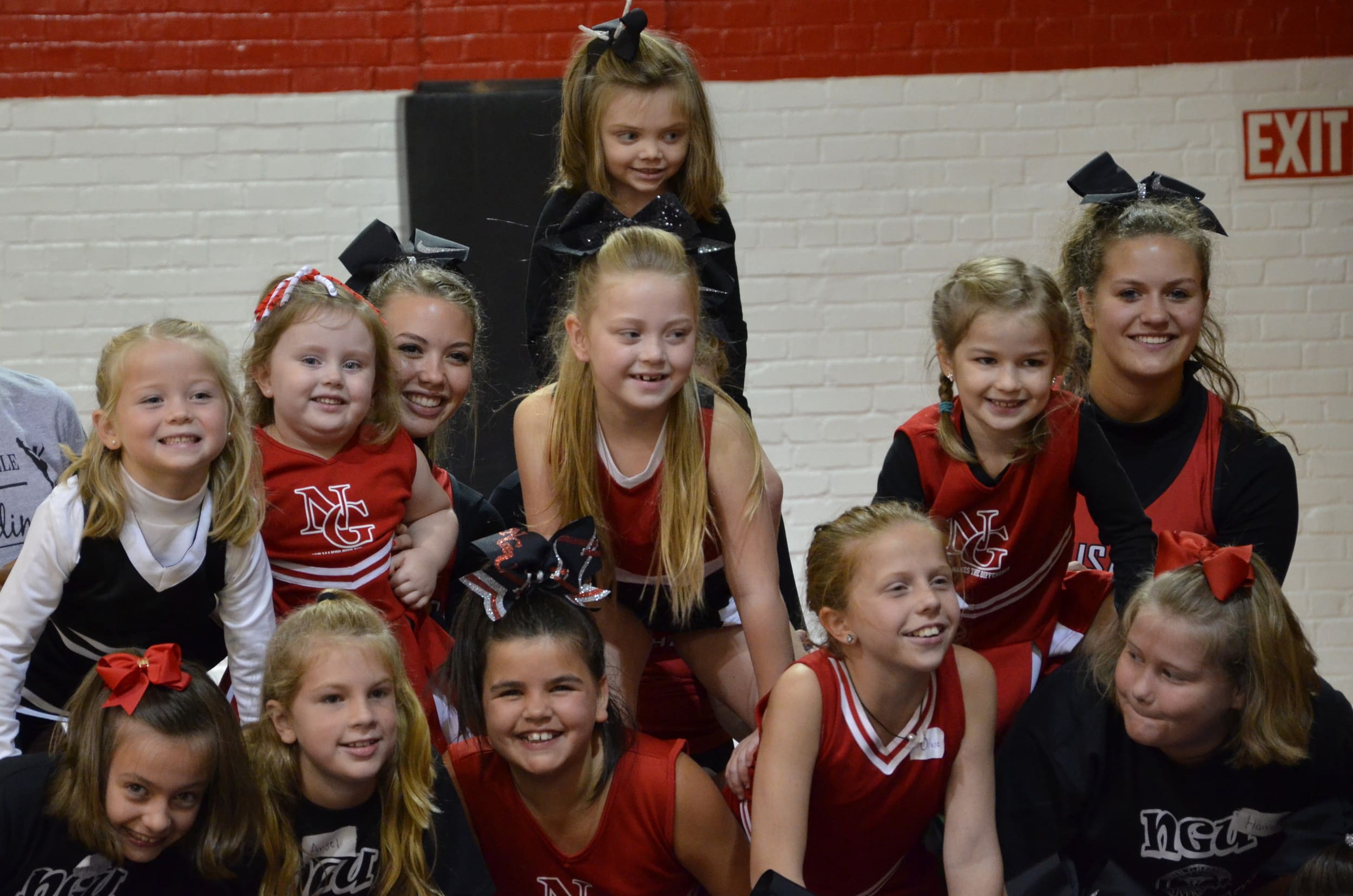  The mini-cheerleaders show off their balancing techniques. 