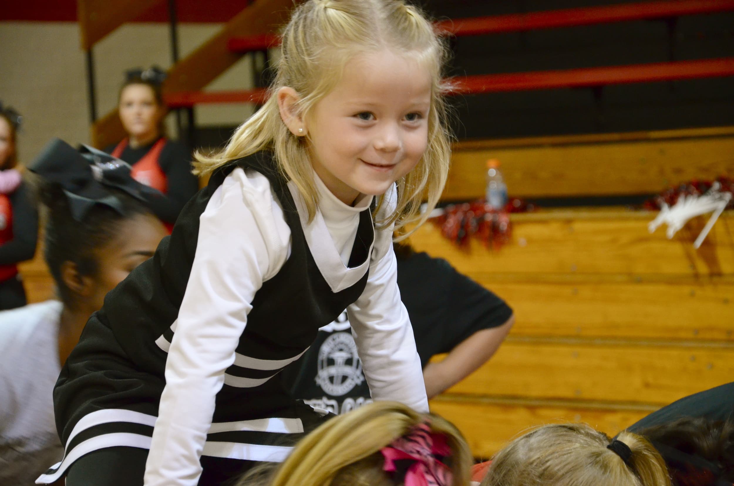  This baby blonde is excited to be on top of the pyramid. 