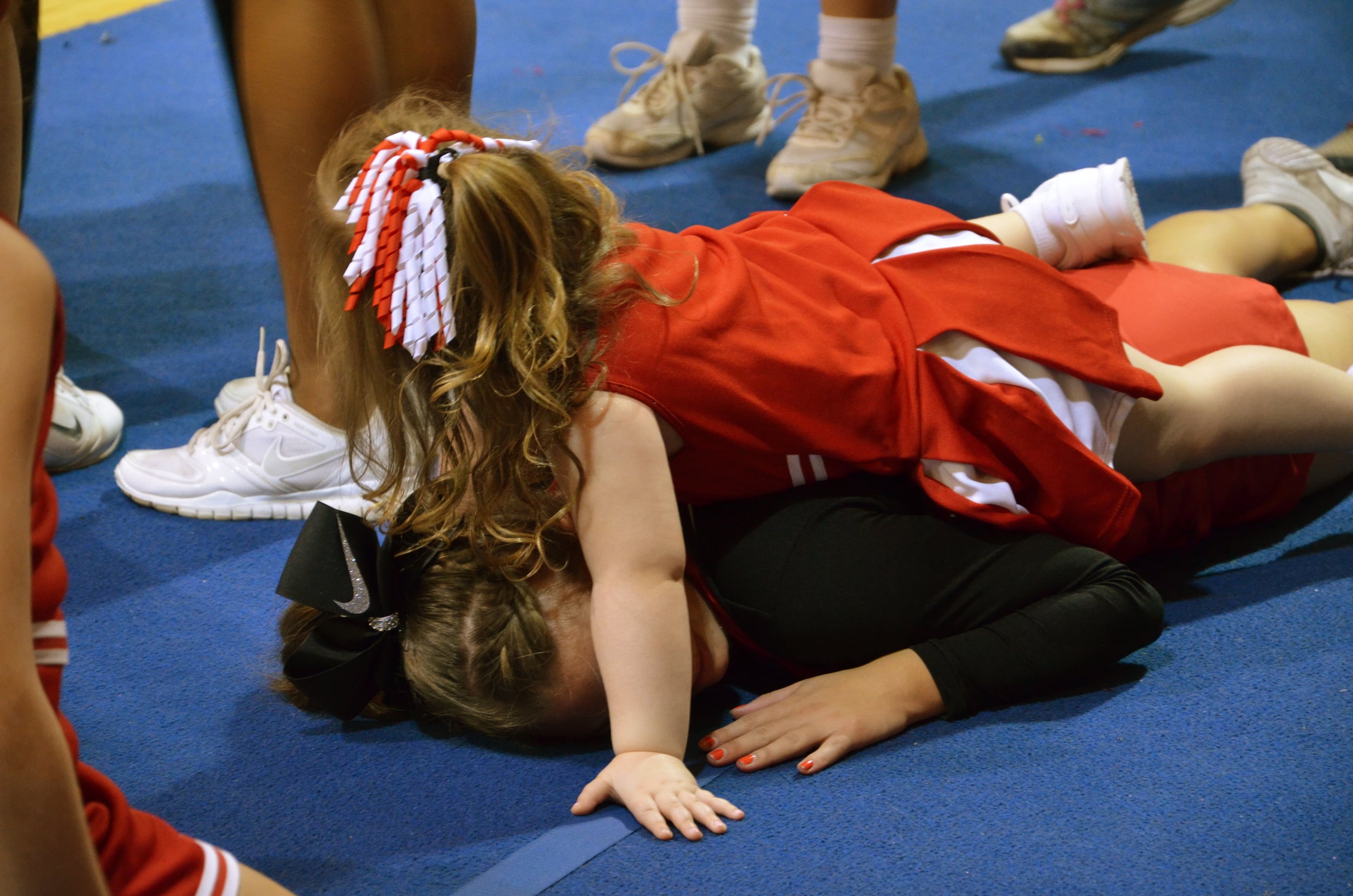  Time for a break after a long morning of games, stunting, and pyramids at NGU's cheer camp Saturday, October 4. 