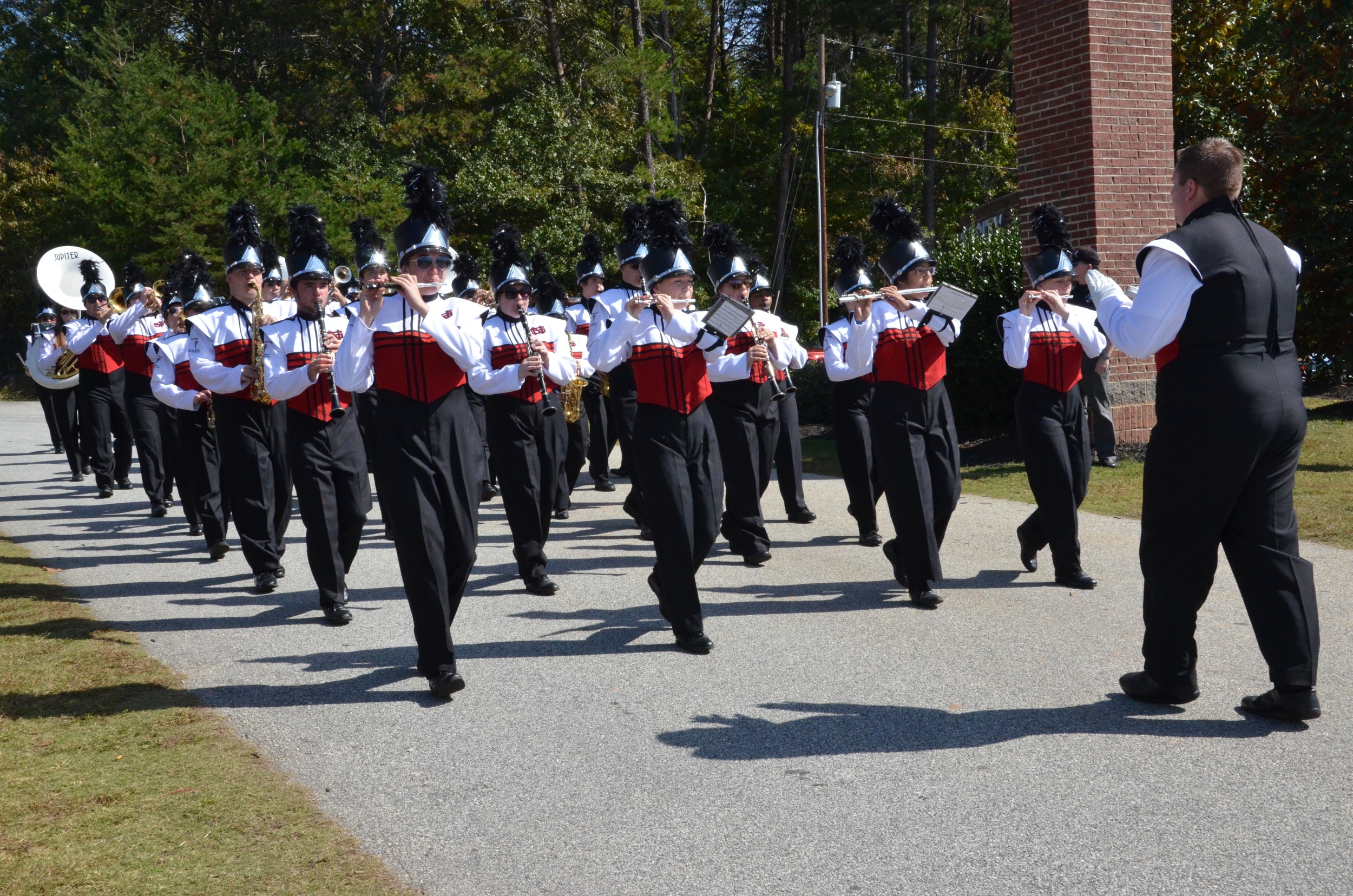  The North Greenville Marching Band starts off the 2014 Homecoming Parade on October 18 at North Greenville University by playing well-known contemporary music. 