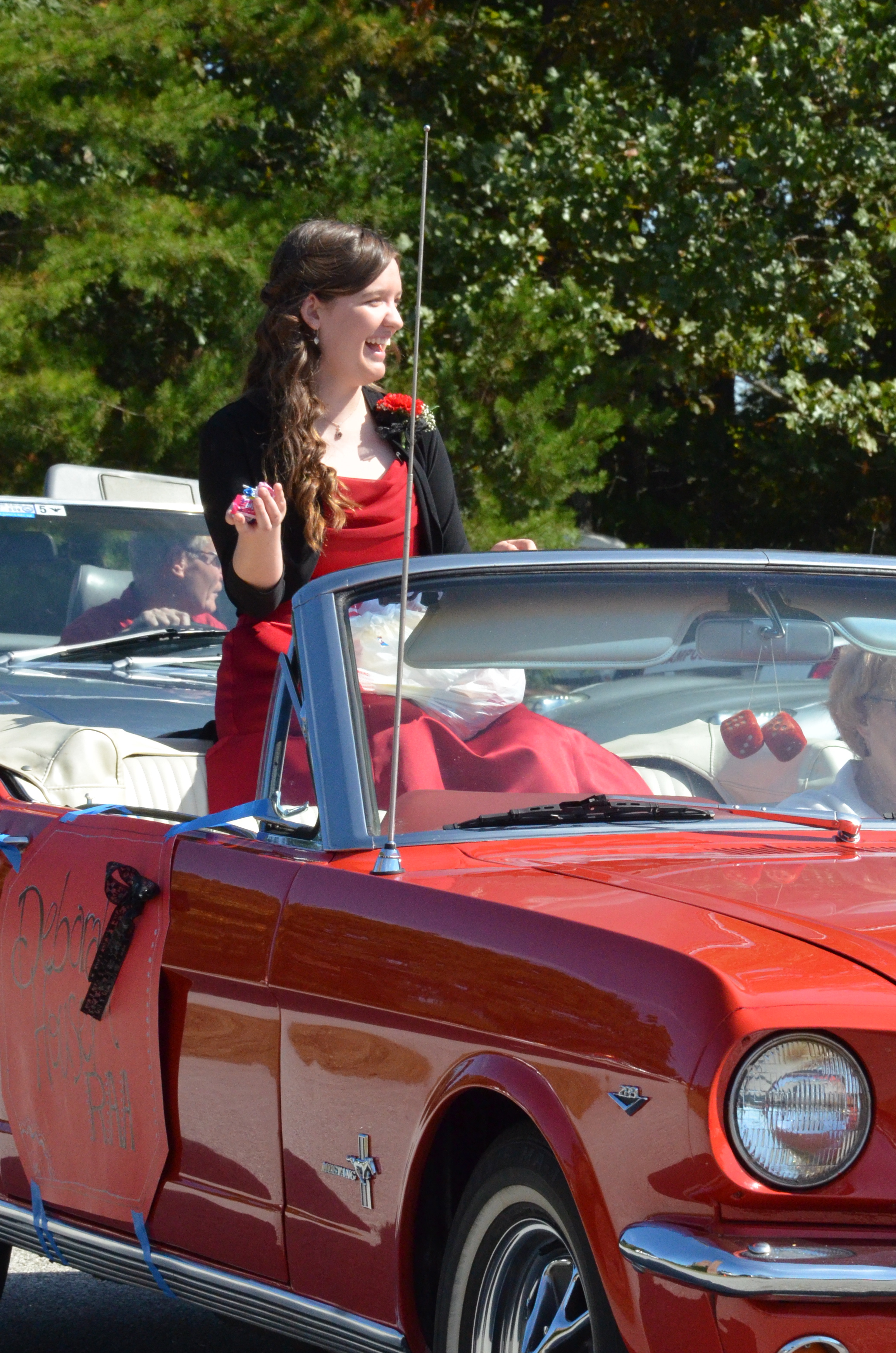  Deborah Houser, representing the RAA's, is ready to throw some candy to the eager spectators. 