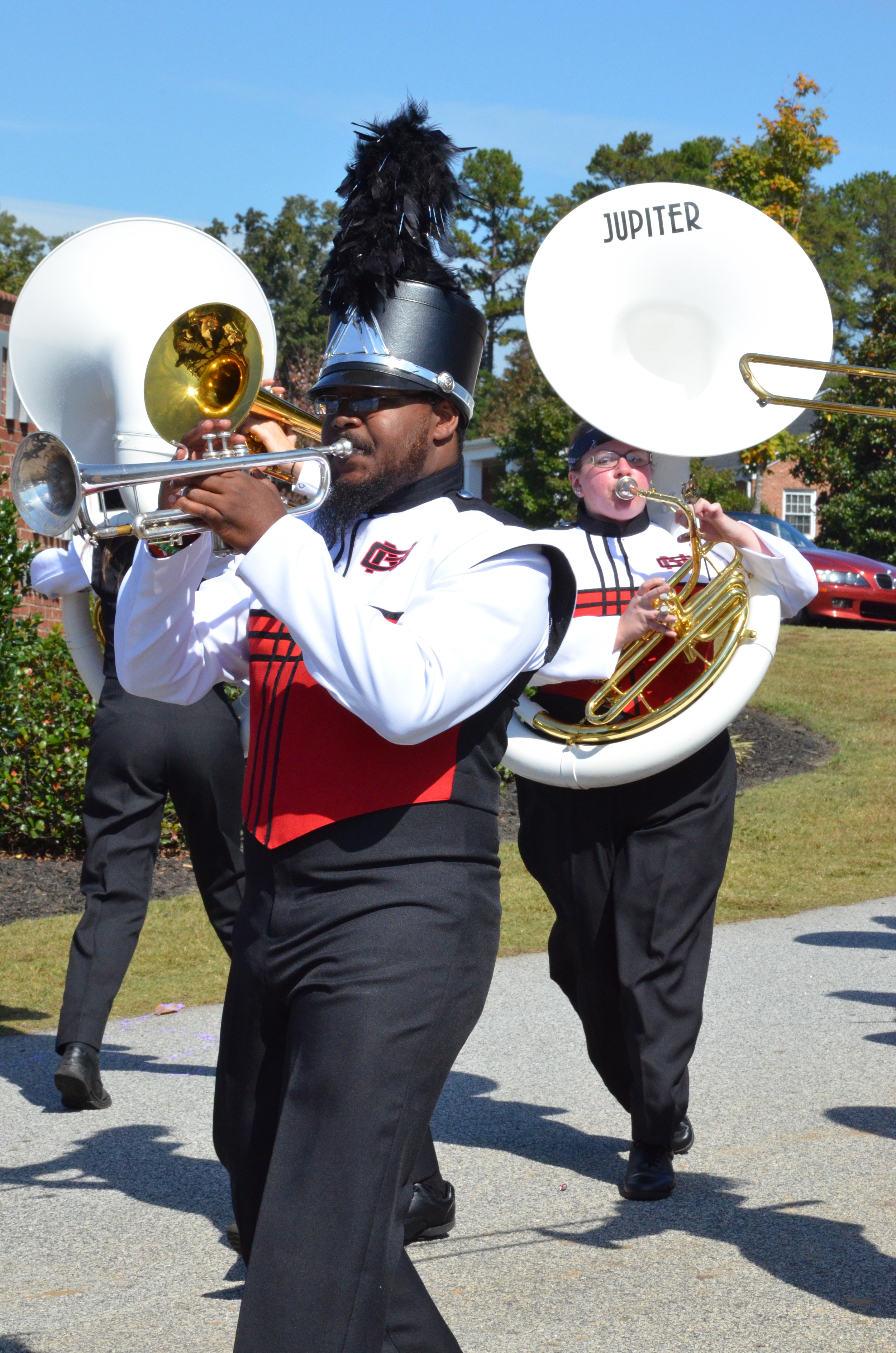  These band members are keeping their heads held high as they walk through the parade. 