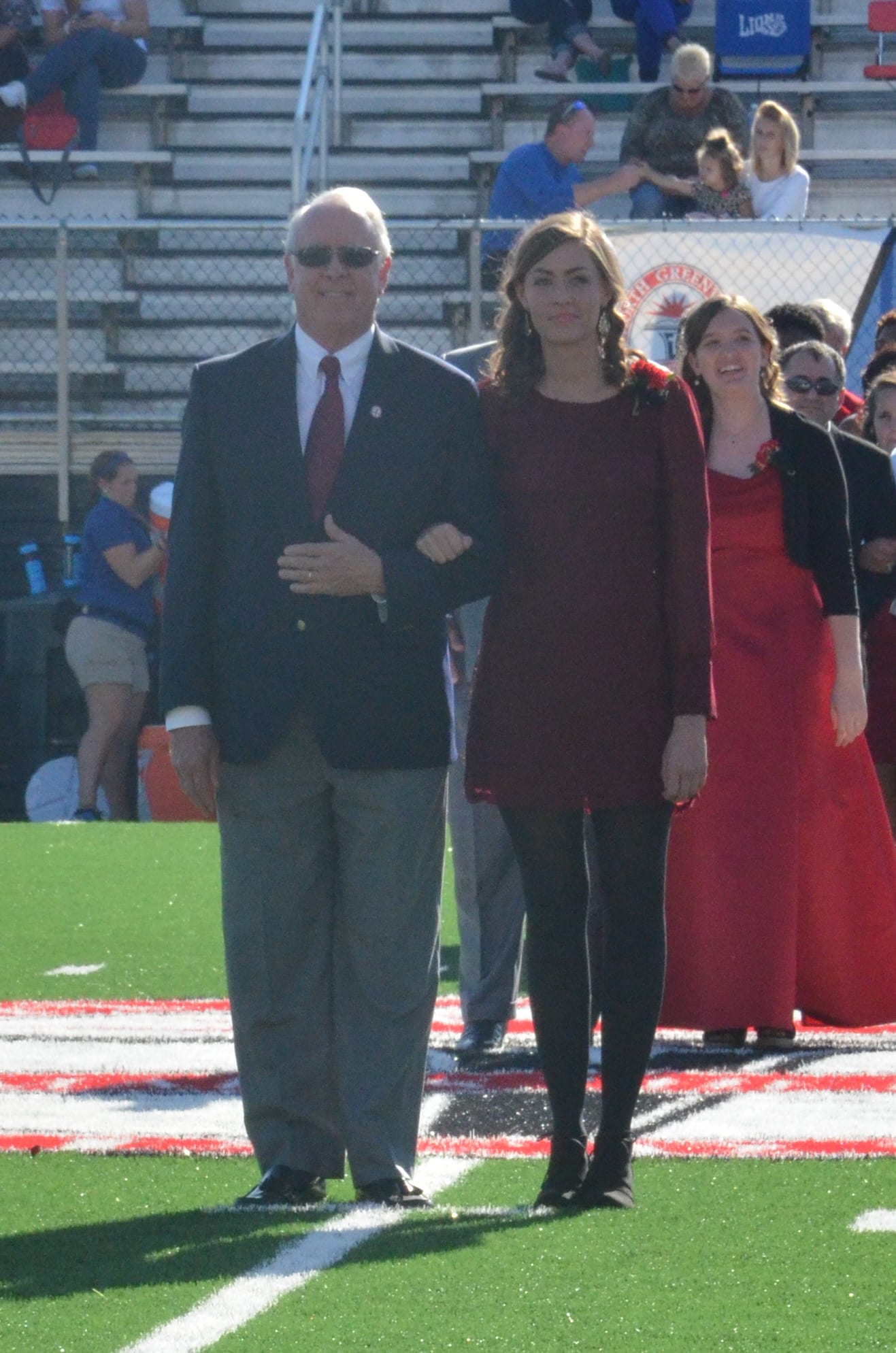  Susan Wood is looking very poised as she stands in the middle of the field.&nbsp;  