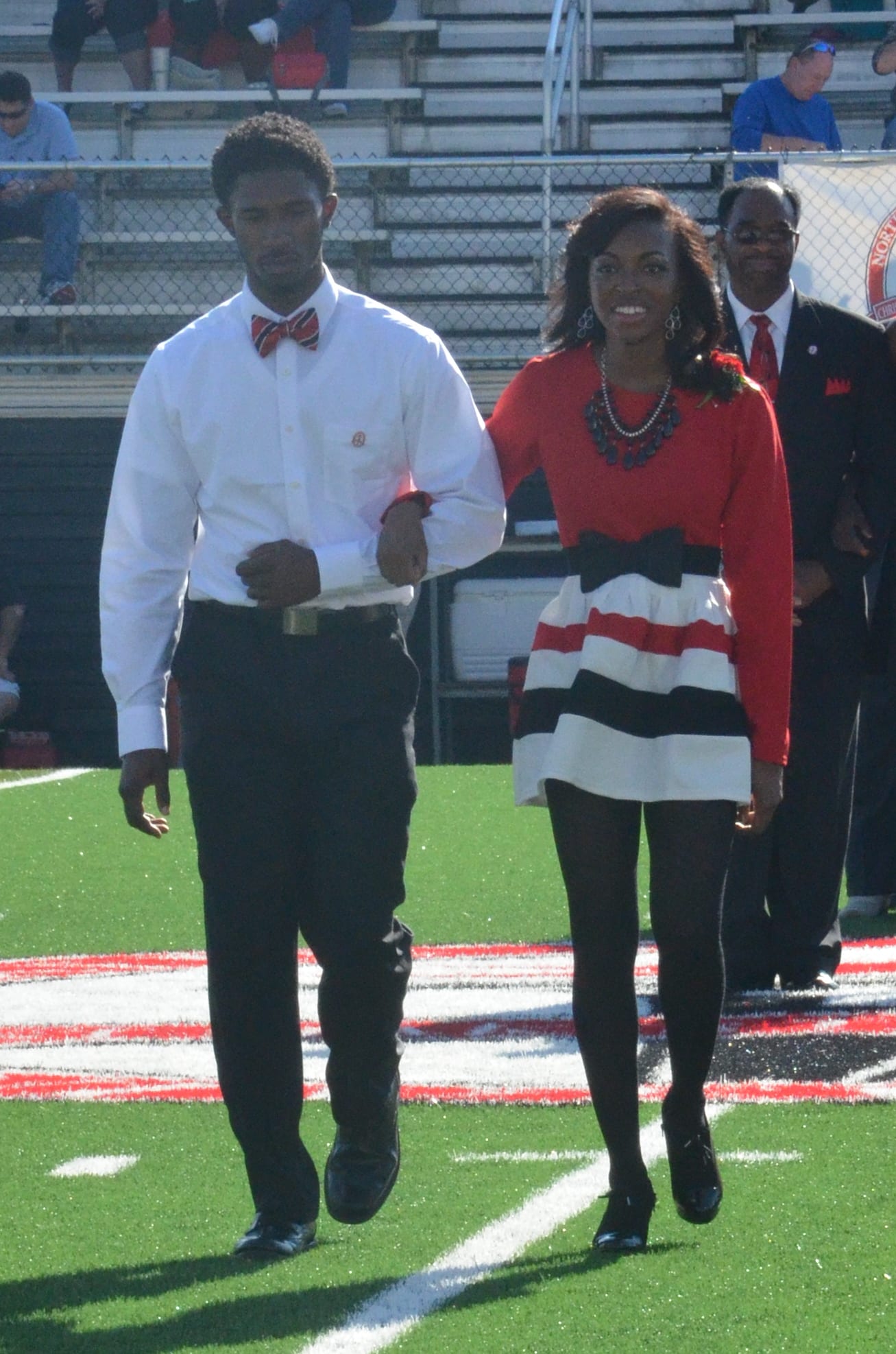  Jay Wilson walks from the center of the field to where she needs to wait. 