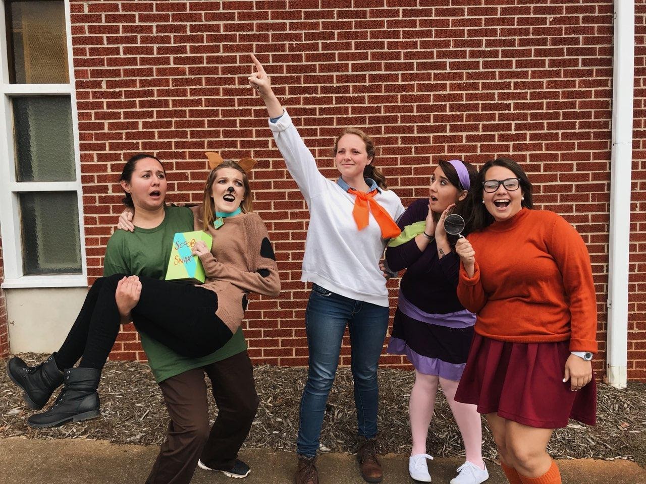 From left to right: Senior Megan Harry, Sophomore Sarah Ellison, Senior Jessica Pearce, Senior Emma Cross, and Junior Holly Jennings pose in the most natural way Mystery Inc. would.&nbsp;