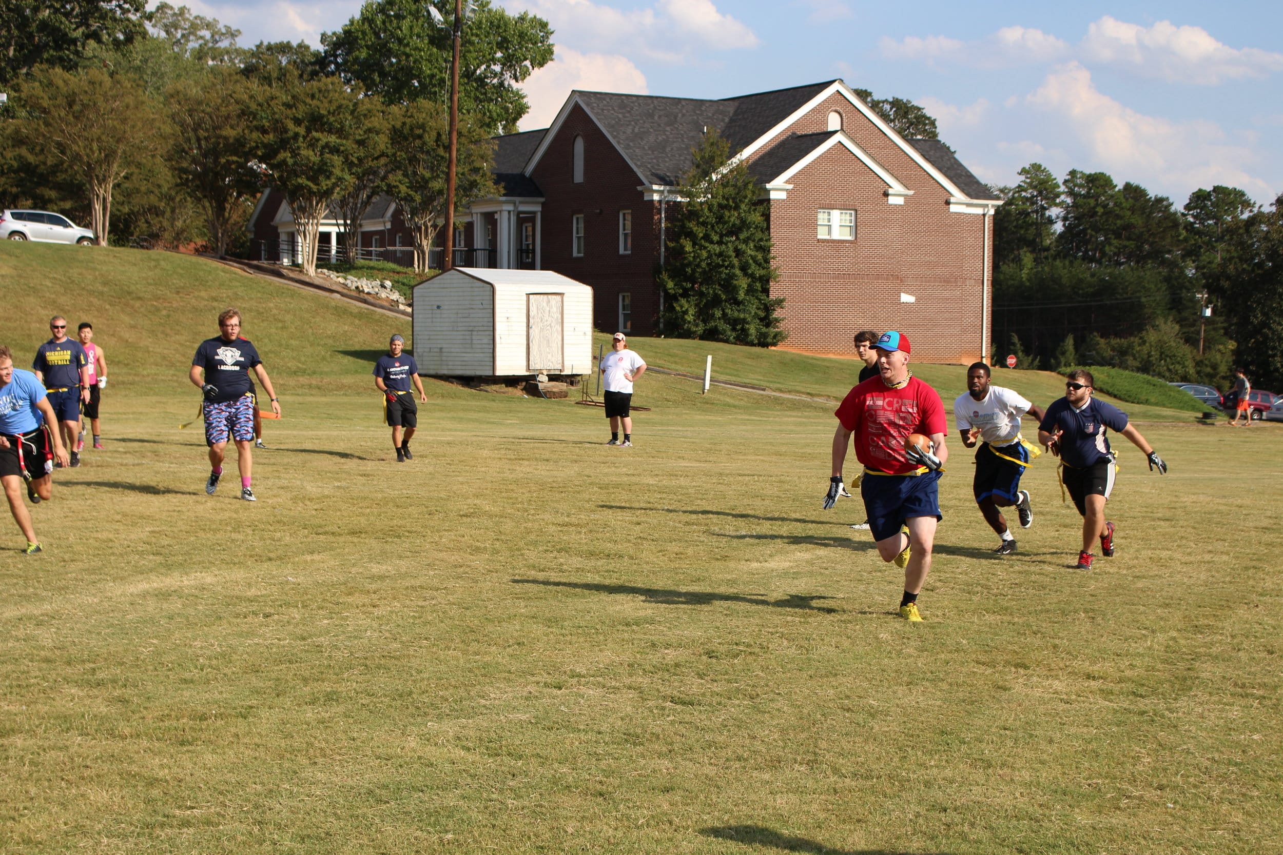  Team Like Father, Like Son intercepts a pass and race down the field to score a touchdown.&nbsp; 